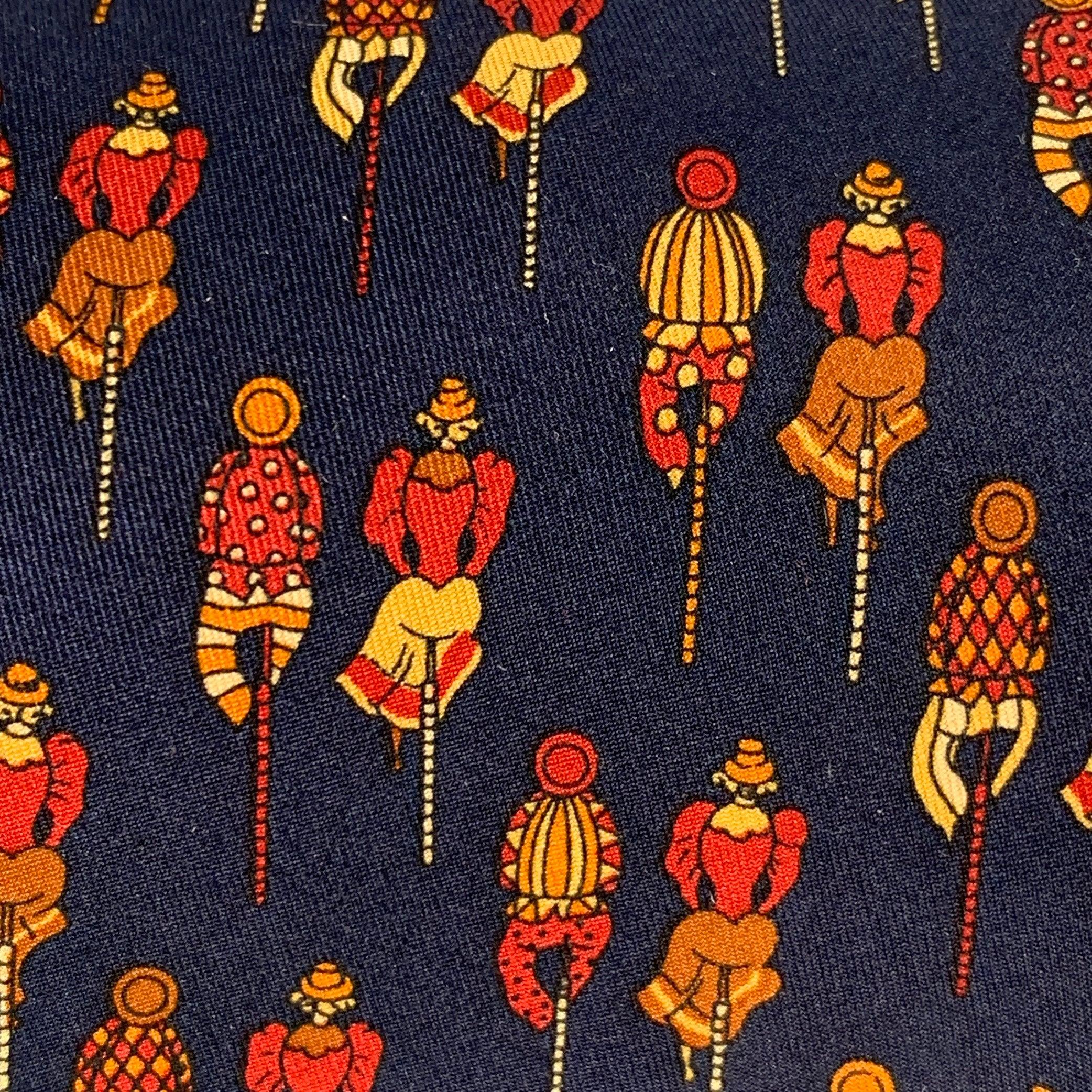 SALVATORE FERRAGAMO
necktie in a navy silk featuring a burgundy figures pattern. Made in Italy.Excellent Pre-Owned Condition. 

Measurements: 
  Width: 3.75 inches Length: 58 inches 
  
  
 
Sui Generis Reference: 134568
Category: Tie
More Details
 