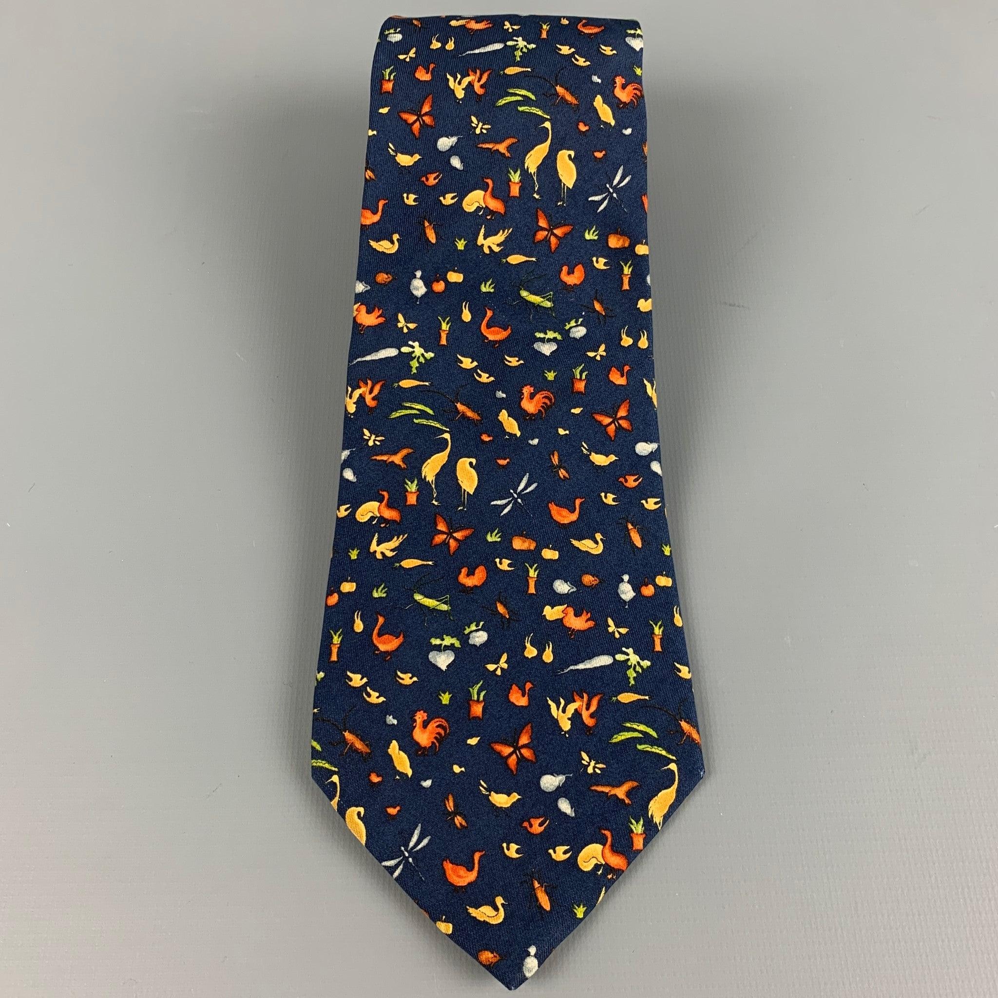 SALVATORE FERRAGAMO
necktie in a navy silk featuring orange farmhouse animals themed pattern. Made in Italy.Excellent Pre-Owned Condition. 

Measurements: 
  Width: 3 inches Length: 58 inches 
  
  
 
Reference: 127304
Category: Tie
More Details
   