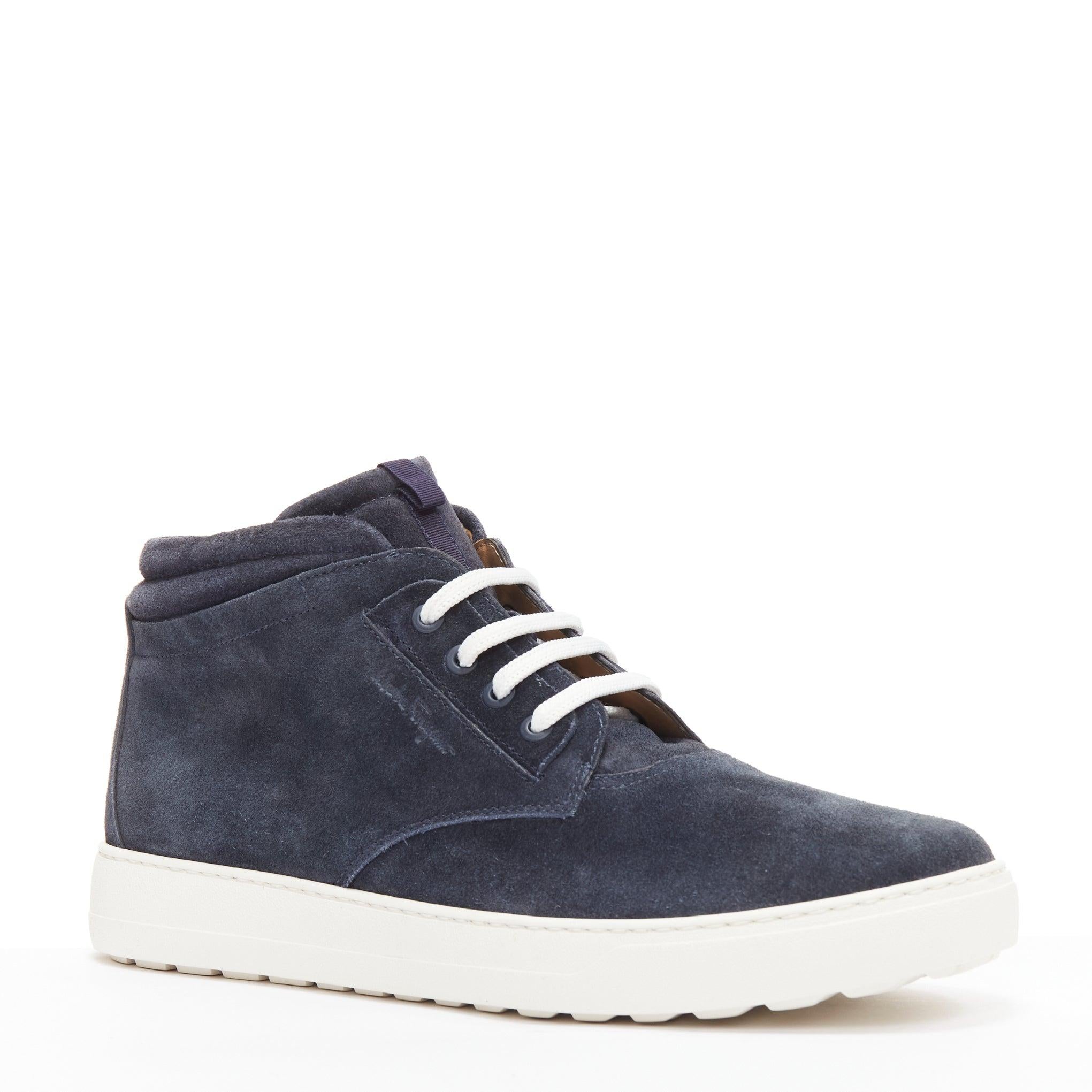 SALVATORE FERRAGAMO navy suede logo deboss high top sneakers UK8.5 EU42.5
Reference: LNKO/A02296
Brand: Salvatore Ferragamo
Material: Suede
Color: Navy, White
Pattern: Solid
Closure: Lace Up
Lining: Nude Leather
Extra Details: Discreet logo scribble