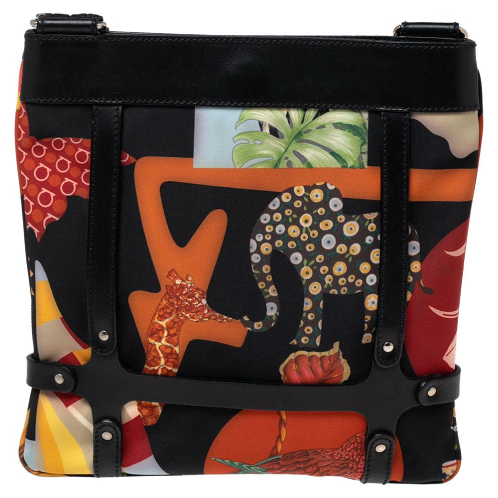 The shoulder bag from the house of Salvatore Ferragamo is made of jungle safari print nylon and leather. Held by an adjustable strap and equipped with a fabric interior, it is a charming, functional accessory you can count on.

Includes: Original