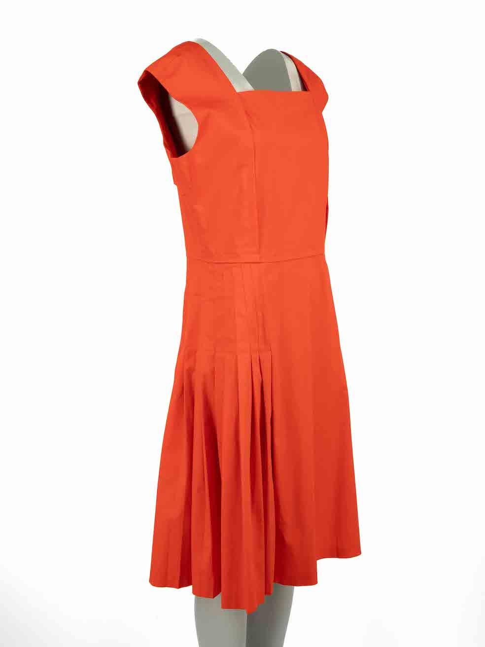 CONDITION is Very good. Minimal wear to dress is evident. Minimal discoloured mark to neckline on this used Salvatore Ferragamo designer resale item.



Details


Orange

Cotton

Dress

Sleeveless

Knee length

Square neckline

Pleated skirt