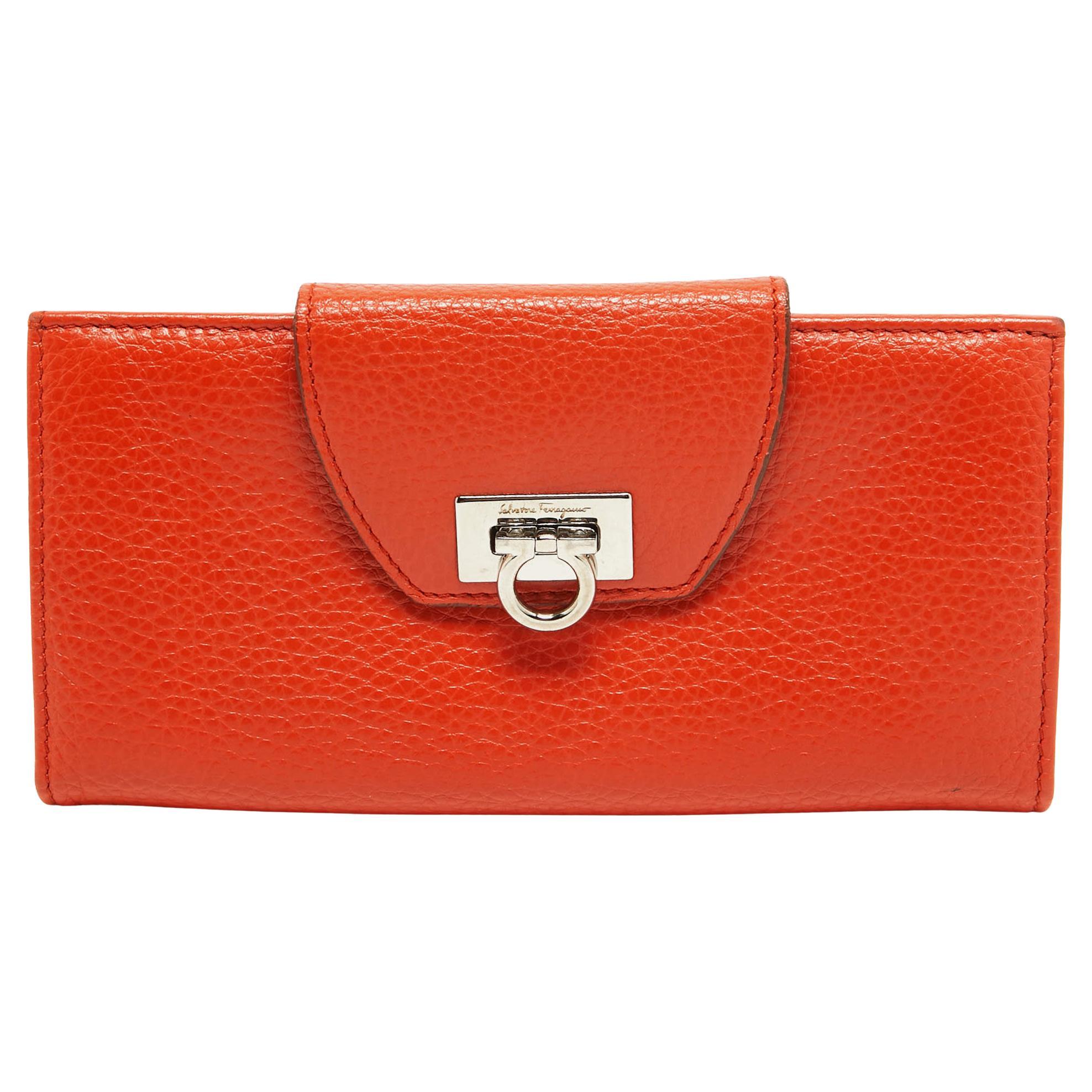 Salvatore Ferragamo Orange Leather Gancini Clasp Flap Wallet For Sale