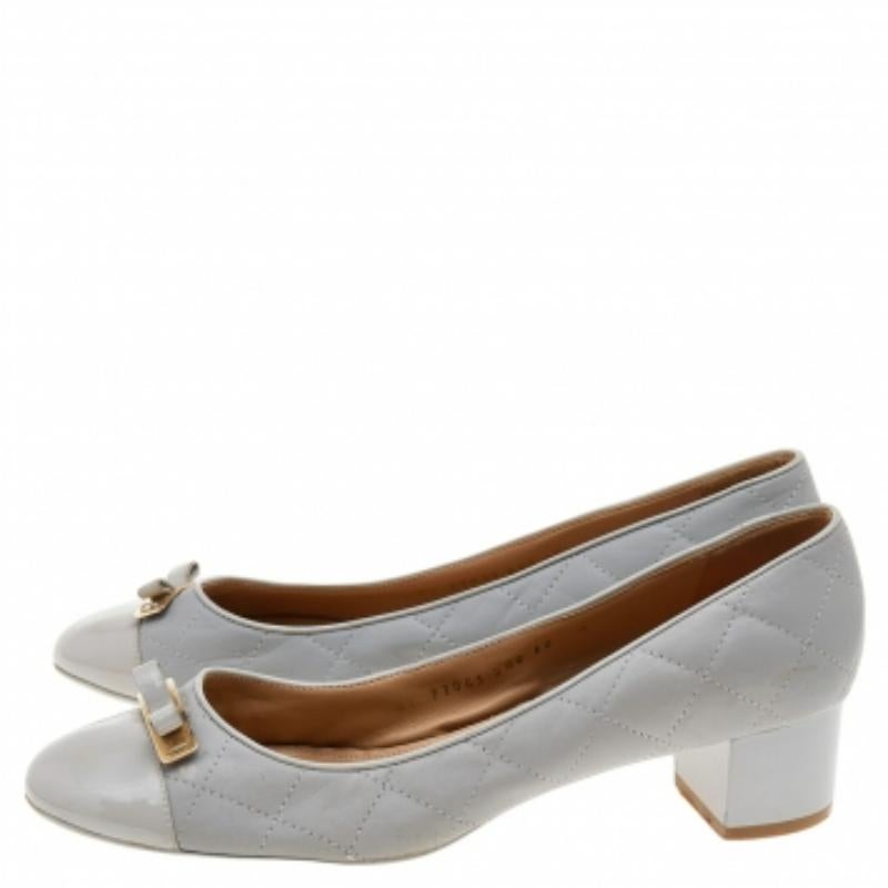 There are some shoes that stand the test of time and fashion cycles, these timeless Salvatore Ferragamo pumps are the one. Crafted from patent leather and quilted leather in a grey shade, they are designed with sleek cuts, round-toes, and block