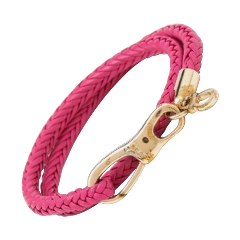Salvatore Ferragamo Bracciale a fascia in pelle intrecciata rosa tono oro in vendita