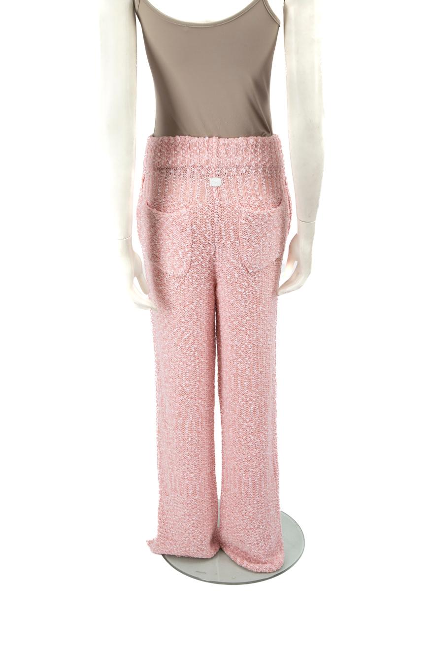 Salvatore Ferragamo Pantalones de pata ancha de punto rosa Talla M Beige en venta