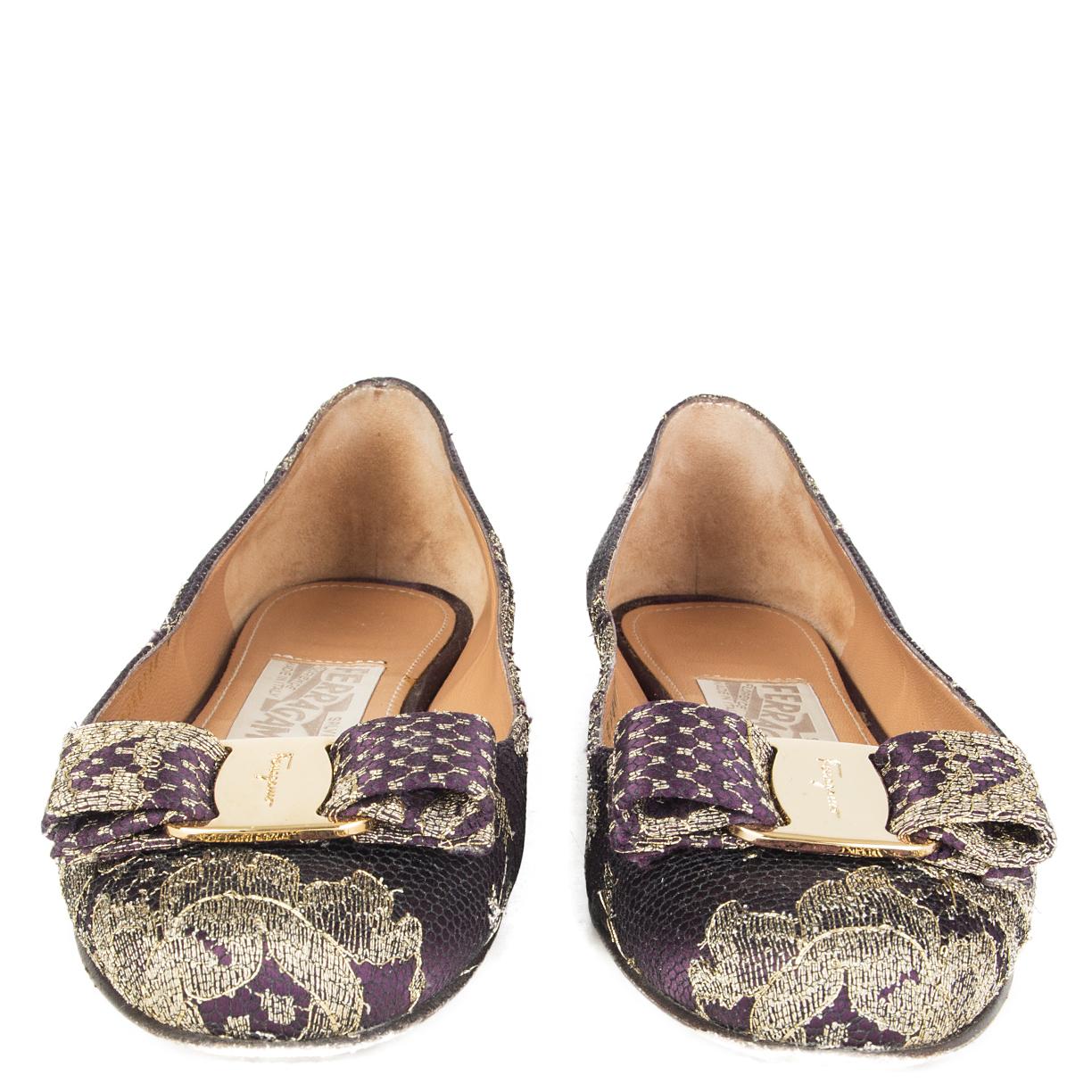 100% authentic Salvatore Ferragamo 'Varina' flats in purple satin covered in metallic lurex lace. Haver been worn and are in excellent condition. 

Measurements
Imprinted Size	35
Shoe Size	35
Inside Sole	22cm (8.6in)
Width	7cm (2.7in)

All our