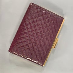 SALVATORE FERRAGAMO Purple Quilted Patent Clutch Bags