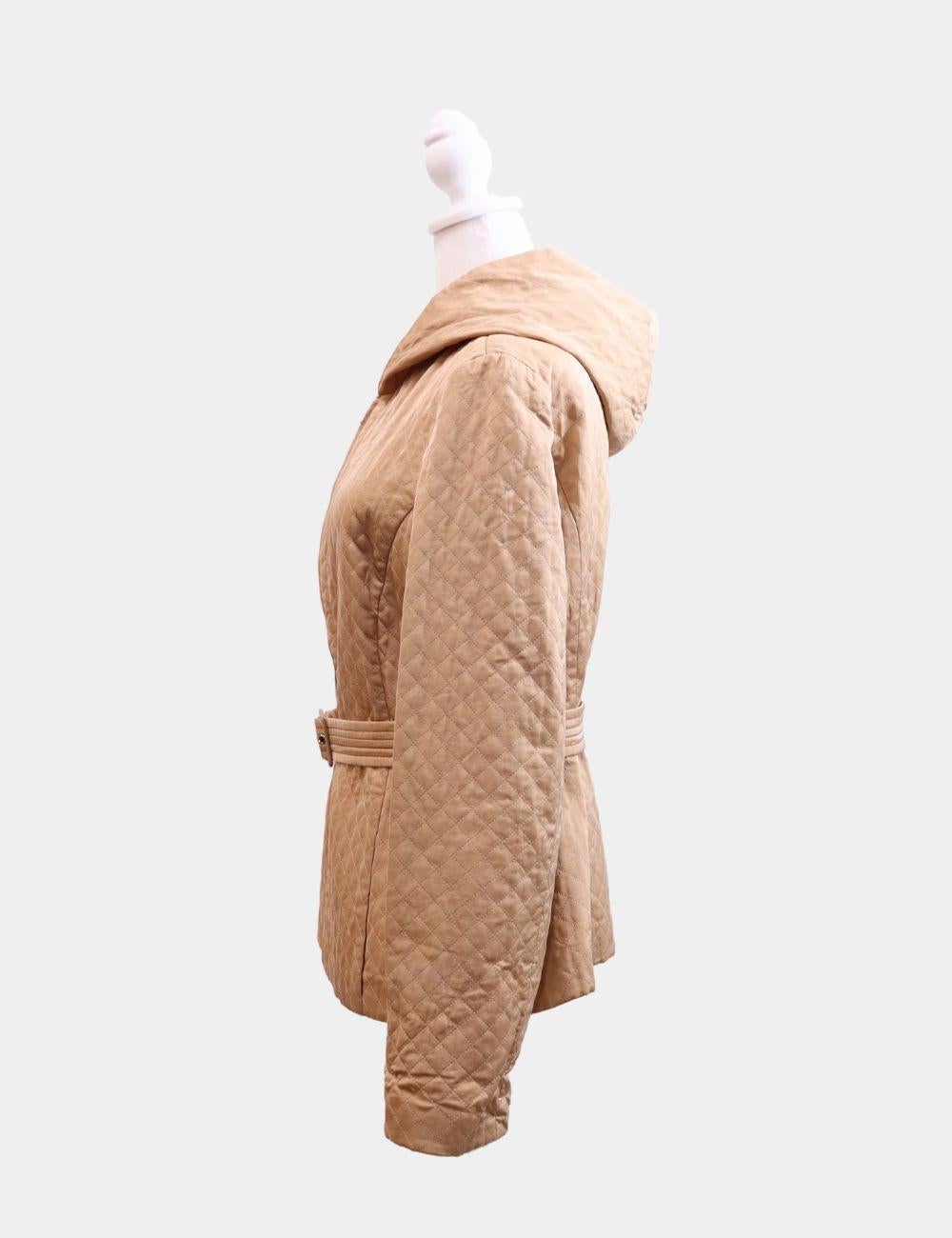 Salvatore Ferragamo Quilted Jacket, Features front zip fastening, waist belt, hood, and long sleeves.

Material: 56% Silk, 44% Cotton
Size: EU 42 / IT 46 / Runs Small
Bust: 100cm
Waist: 86cm
Hip: 106cm
Condition: Good