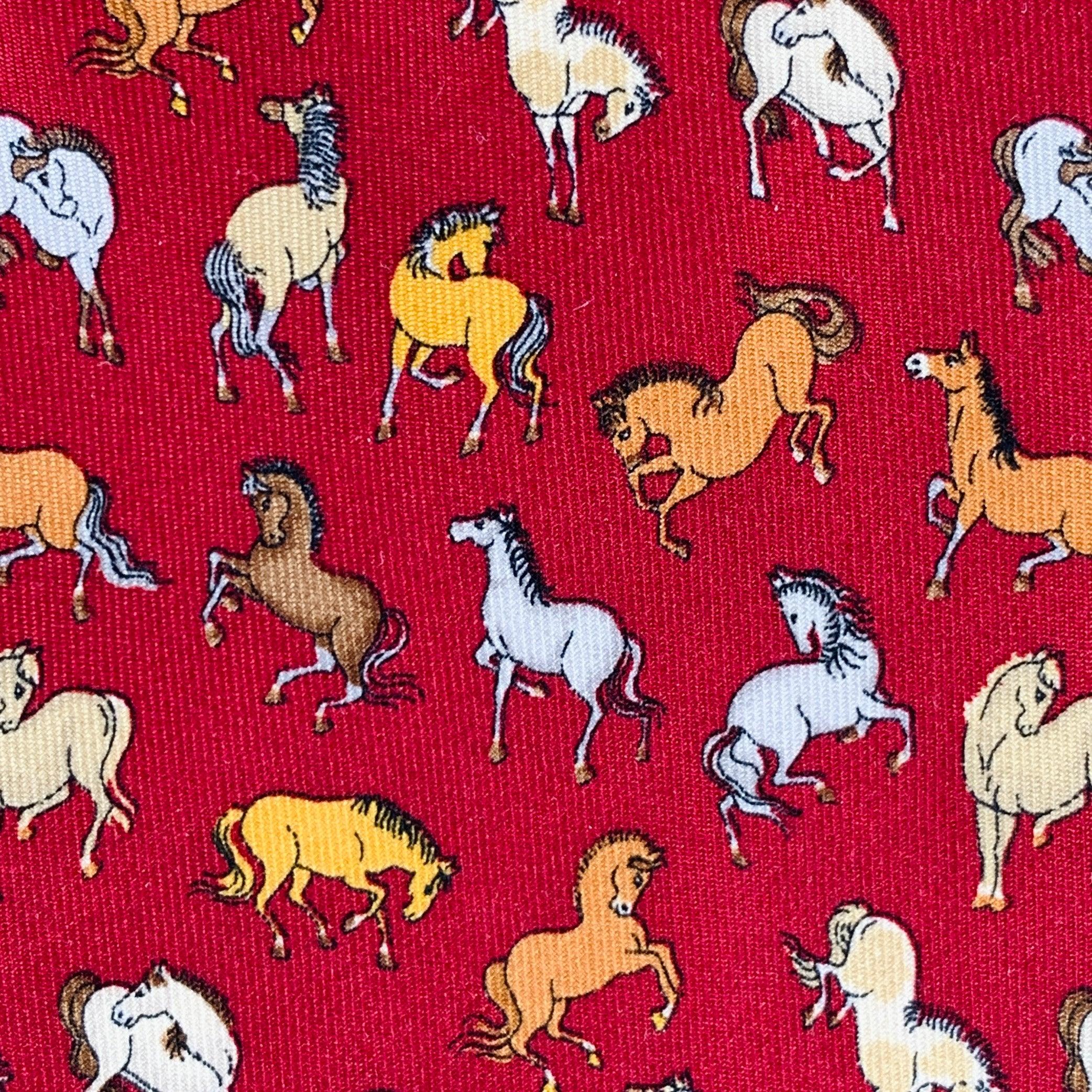 SALVATORE FERRAGAMO necktie in a red silk featuring an orange and yellow horses pattern. Made in Italy.Excellent Pre-Owned Condition. 

Measurements: 
  Width: 3.5 inches Length: 58 inches  
  
  
 
Sui Generis Reference: 134579
Category: Tie
More