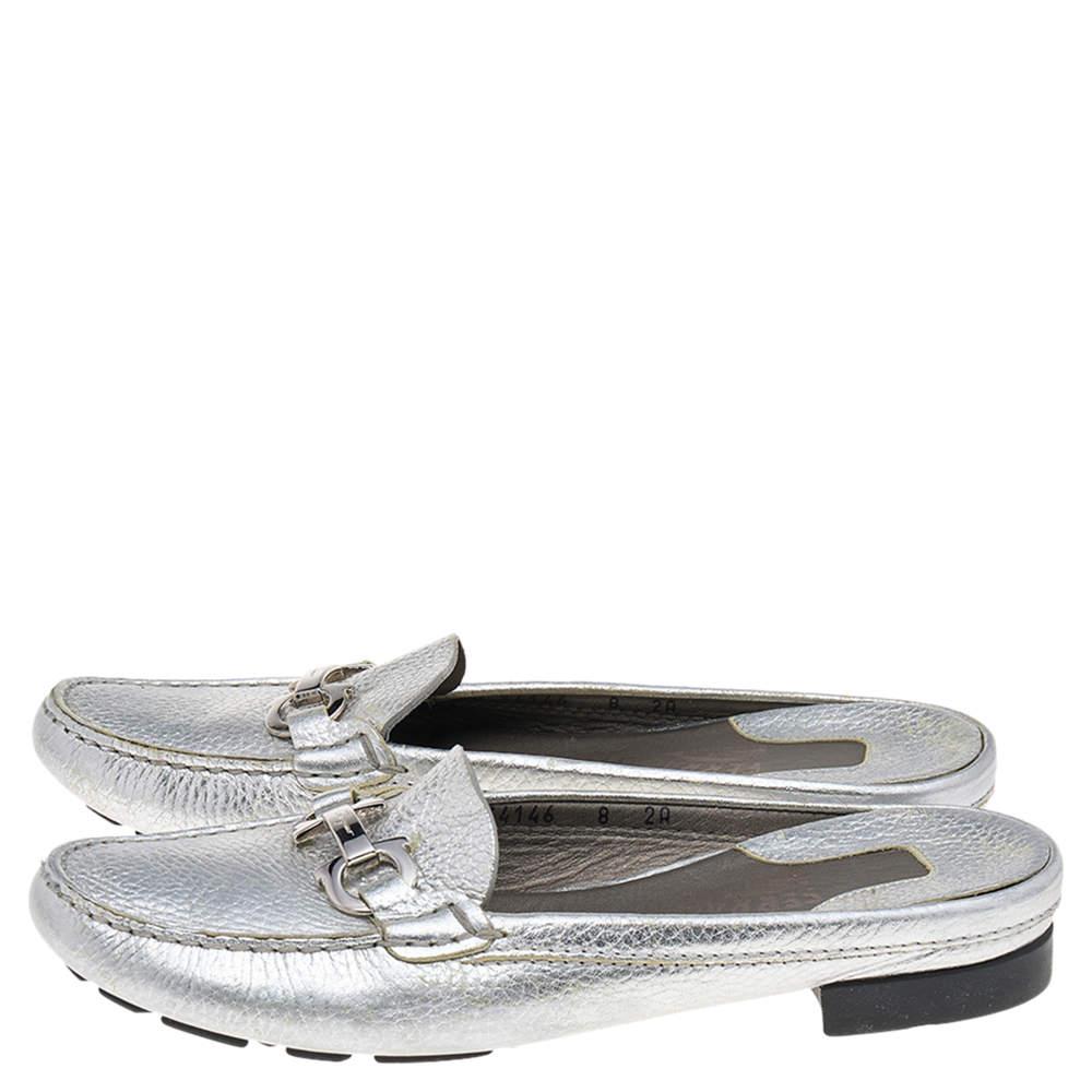 These mules from the House of Salvatore Ferragamo are crafted to perfection. They are made from silver leather on the exterior and showcase a silver-toned Gancini motif on the vamps. Their slip-on style makes them very comfortable for everyday use.

