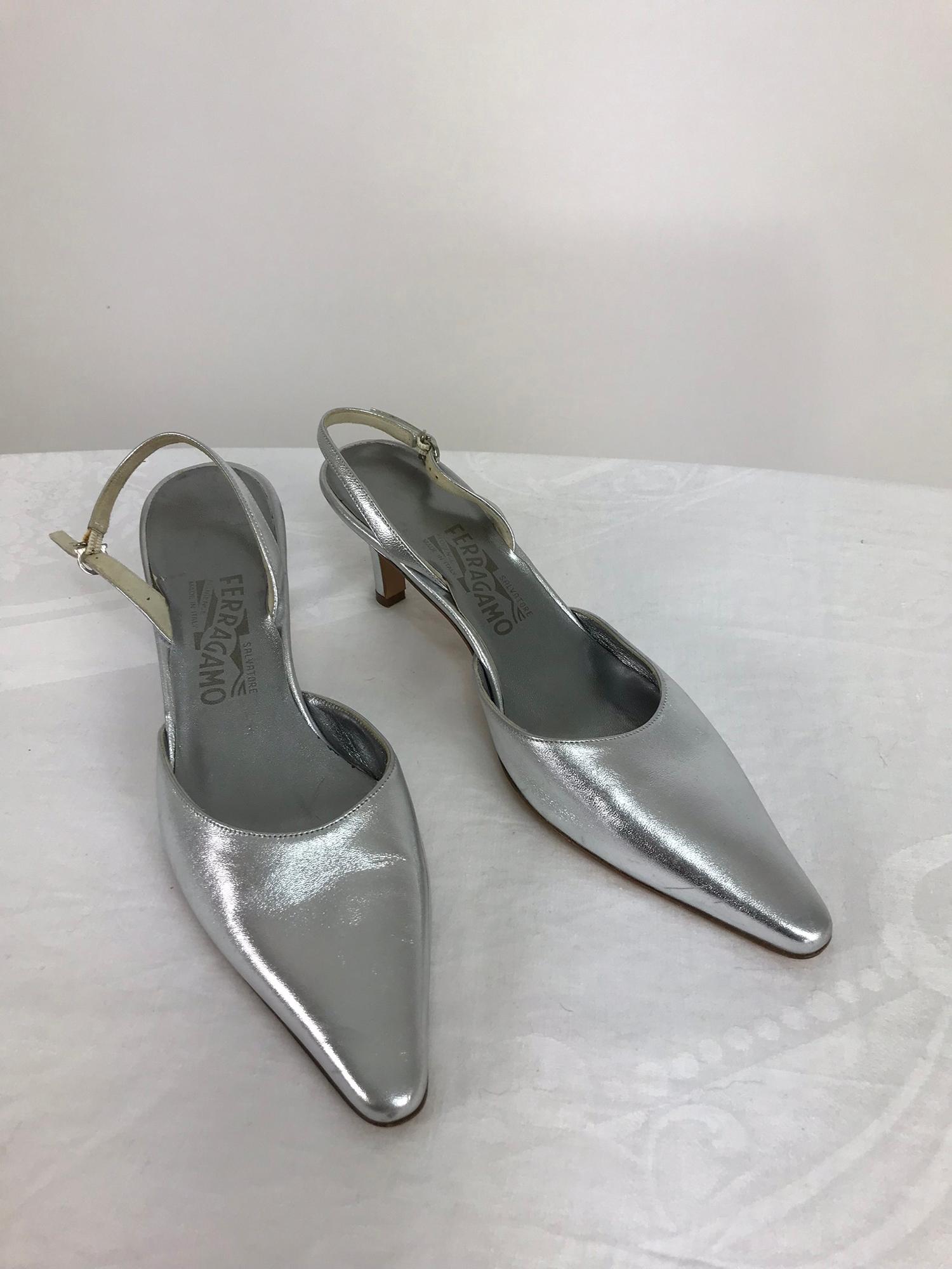 Salvatore Ferragamo silver leather sling back heels 8 1/2AA. Gorgeous silver lame leather, pointed toe, sling back pumps with 2 3/4 inch heels, adjustable strap buckle. Barely worn. 
