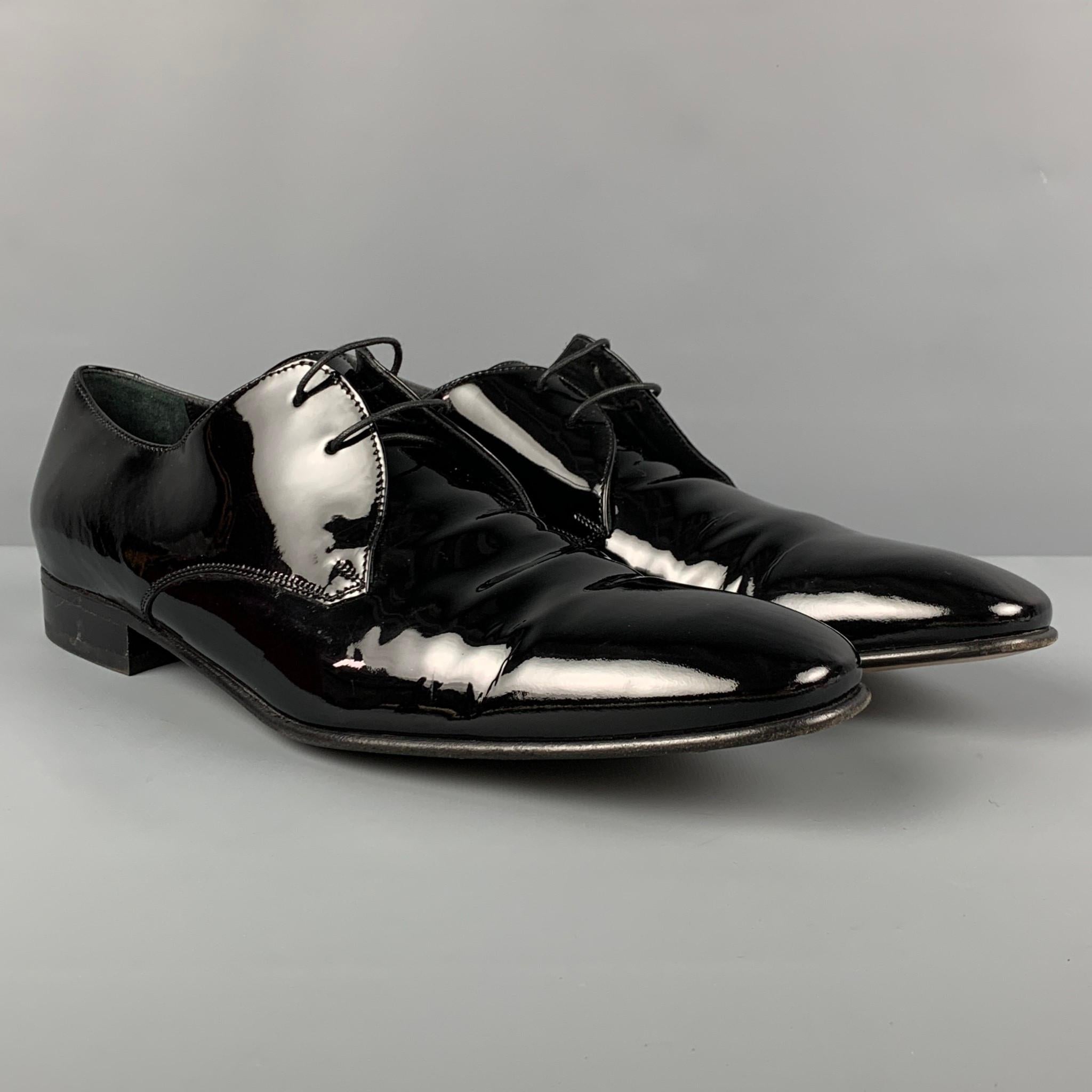 SALVATORE FERRAGAMO shoes comes in black patent leather featuring a square toe and a lace up closure. Made in Italy. 

Very Good Pre-Owned Condition.
Marked: 31 VF 20082 15 11 11D

Outsole: 12.5 in. x 4 in. 