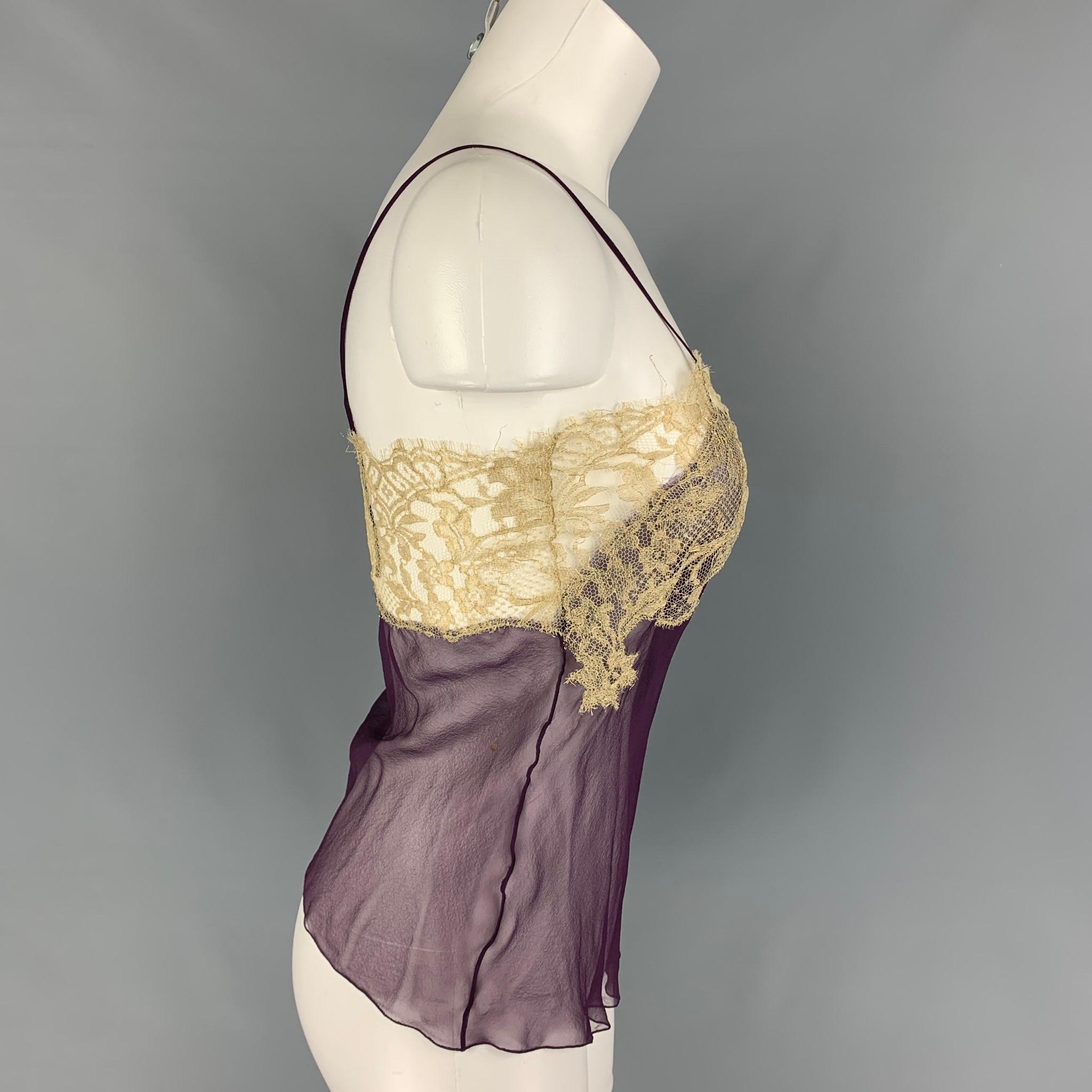 SALVATORE FERRAGAMO camisole blouse comes in a eggplant silk featuring a gold tone lace and spaghetti straps. Made in Italy. 

Very Good Pre-Owned Condition.
Marked: 38

Measurements:

Bust: 30 in.
Length: 16.5 in. 