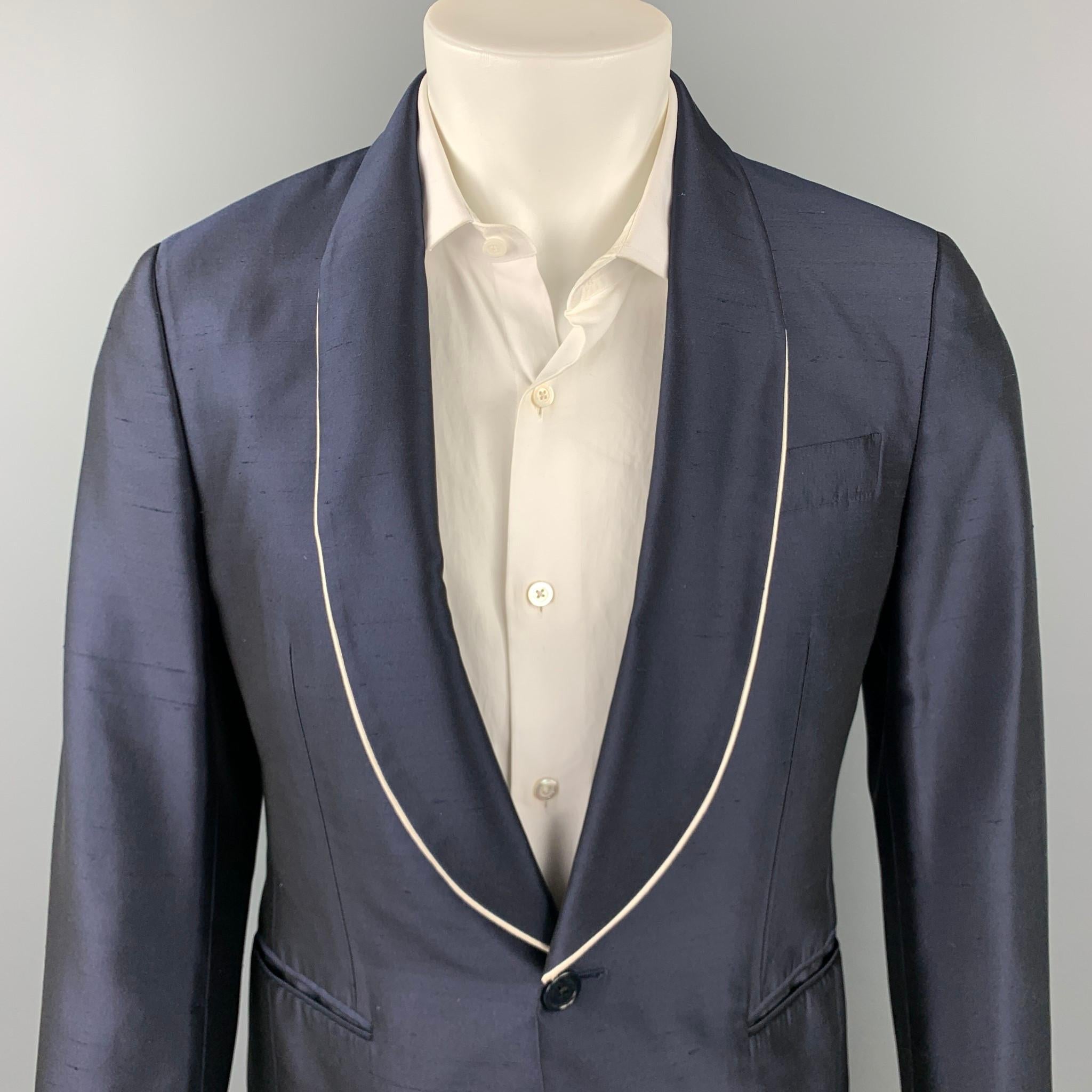 SALVATORE FERRAGAMO sport coat comes in a navy silk with a full liner featuring a shawl lapel, slit pockets, and a single button closure. Made in Italy.

Excellent Pre-Owned Condition.
Marked: IT 38

Measurements:

Shoulder: 17 in. 
Chest: 38 in.