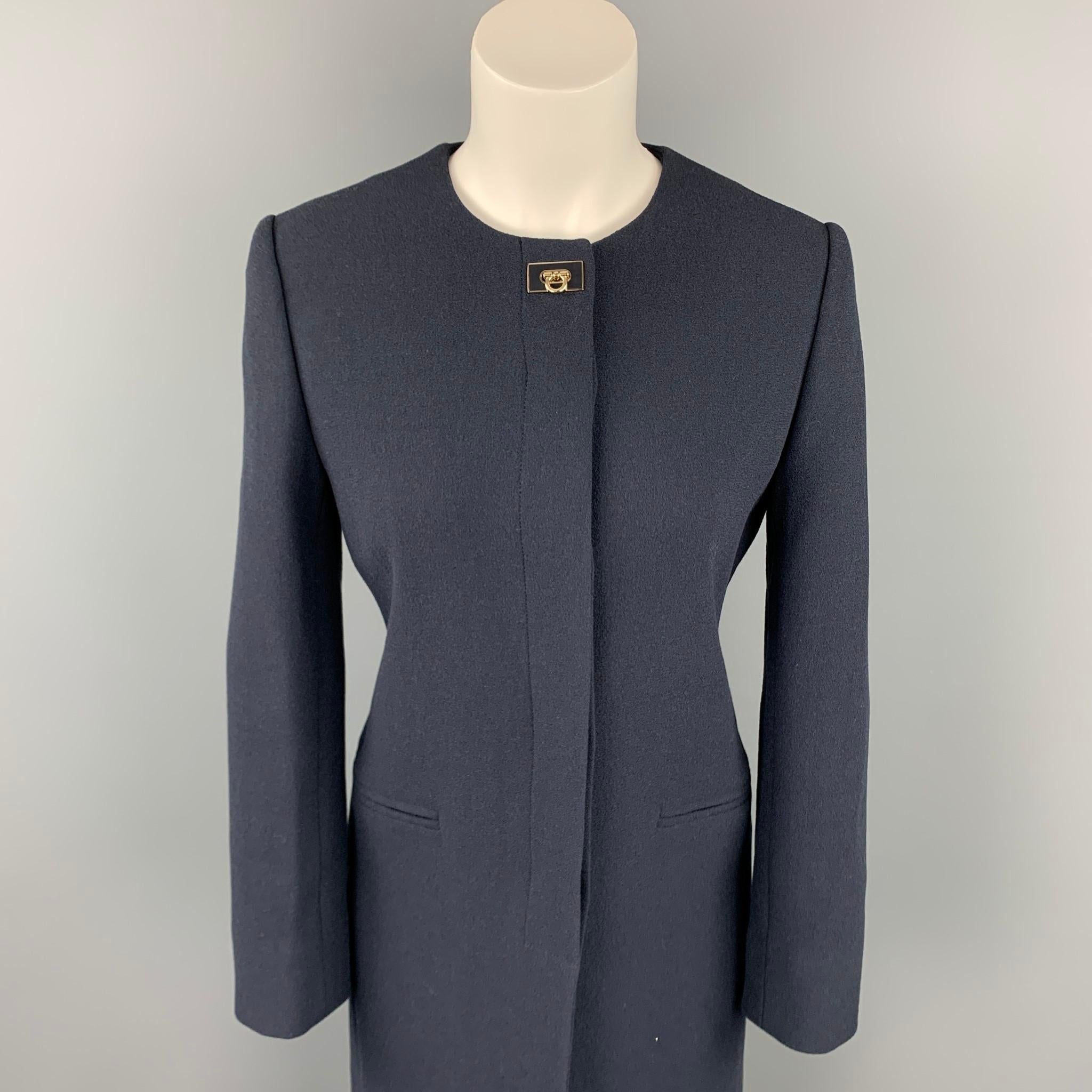 SALVATORE FERRAGAMO coat comes in a navy wool / silk with a full print liner featuring a collarless style, back strap, slit pockets, and a hidden button closure. Made in Italy.

New With Tags. 
Marked: IT 38
Original Retail Price: