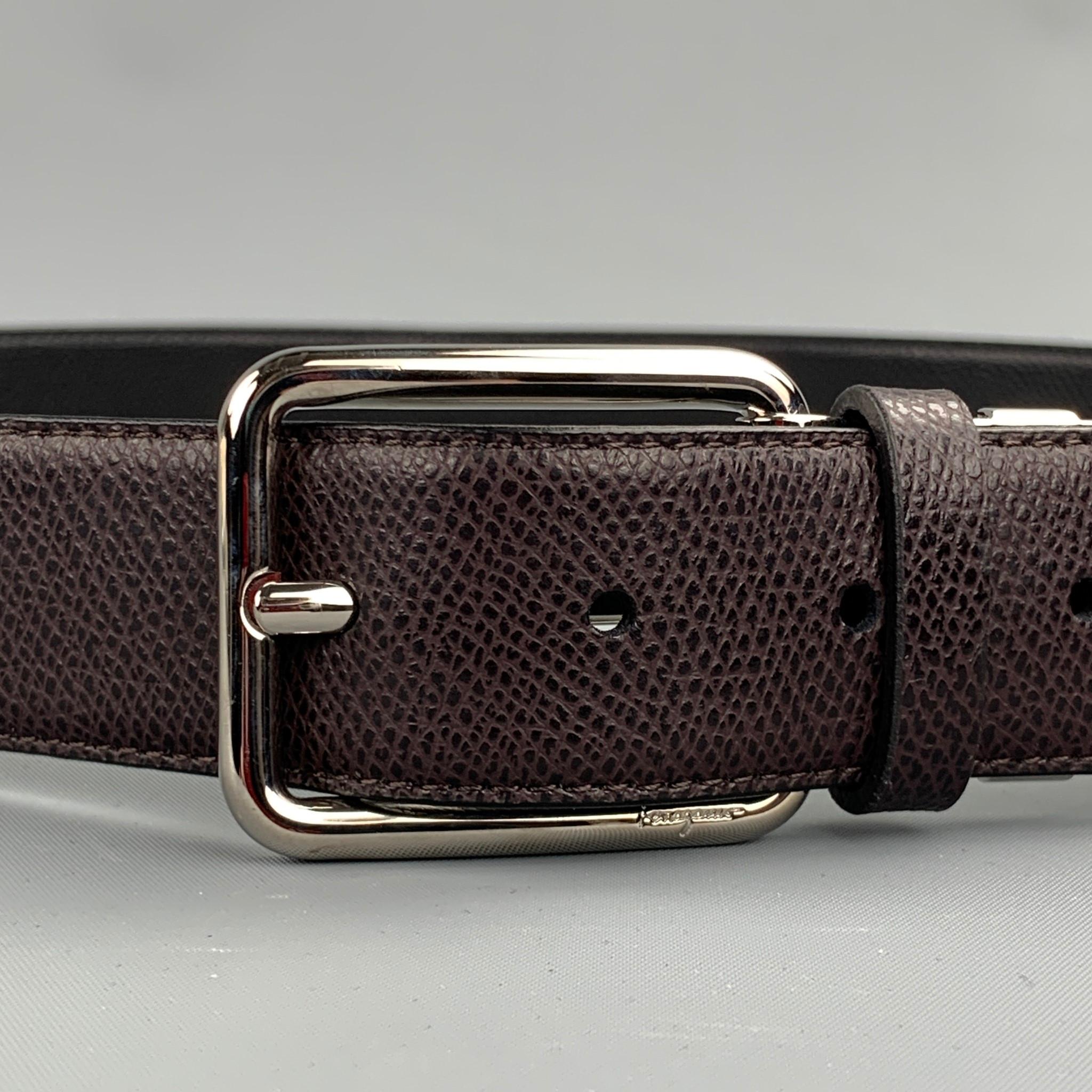 SALVATORE FERRAGAMO belt comes in a brown leather featuring a silver tone buckle closure. Made in Italy.

Excellent Pre-Owned Condition.
Marked: No size marked

Length: 45 in. 
Width: 1.5 in. 
Fits: 37 in. - 41 in. 
Buckle: 2 in. 