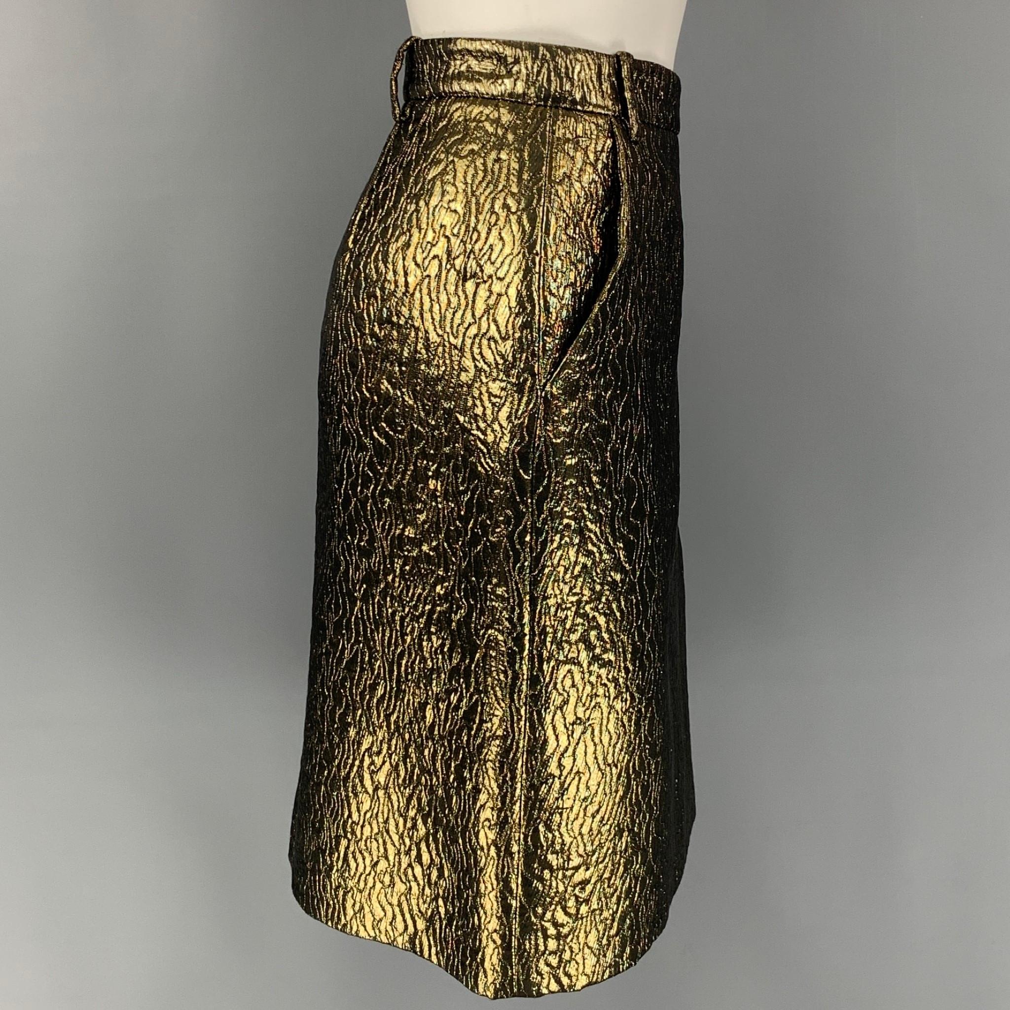 SALVATORE FERRAGAMO skirt comes in a gold & black textured polyester blend featuring a wrap style, belt loops, slit pockets, and a back zipper closure. Made in Italy. 

Excellent Pre-Owned Condition.
Marked: 42

Measurements:

Waist: 30 in.
Hip: 38