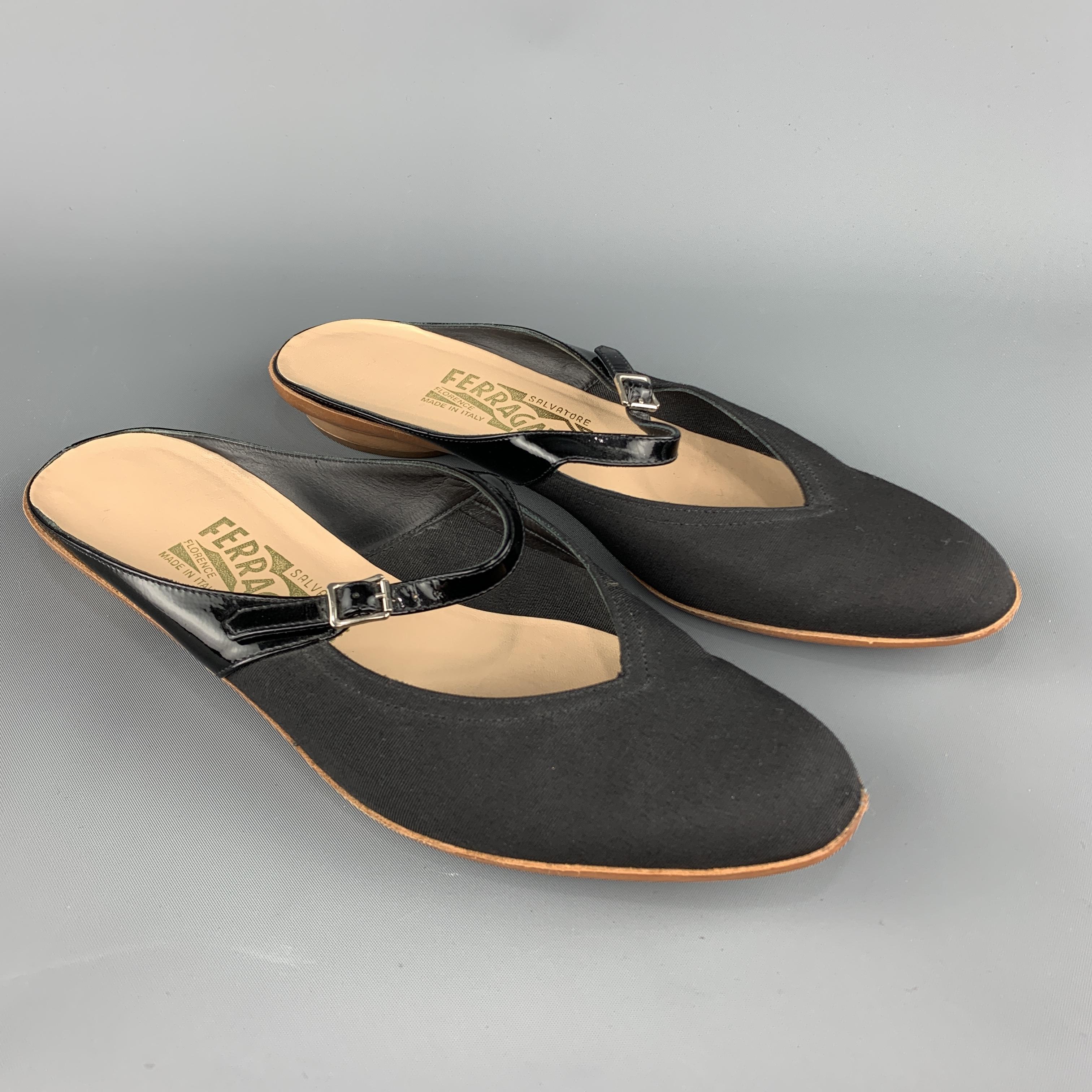Vintage SALVATORE FERRAGAMO flats come in black faille with a patent Mary Jane strap. Made in Italy.
 
Excellent Pre-Owned Condition.
Marked: 7 1/2