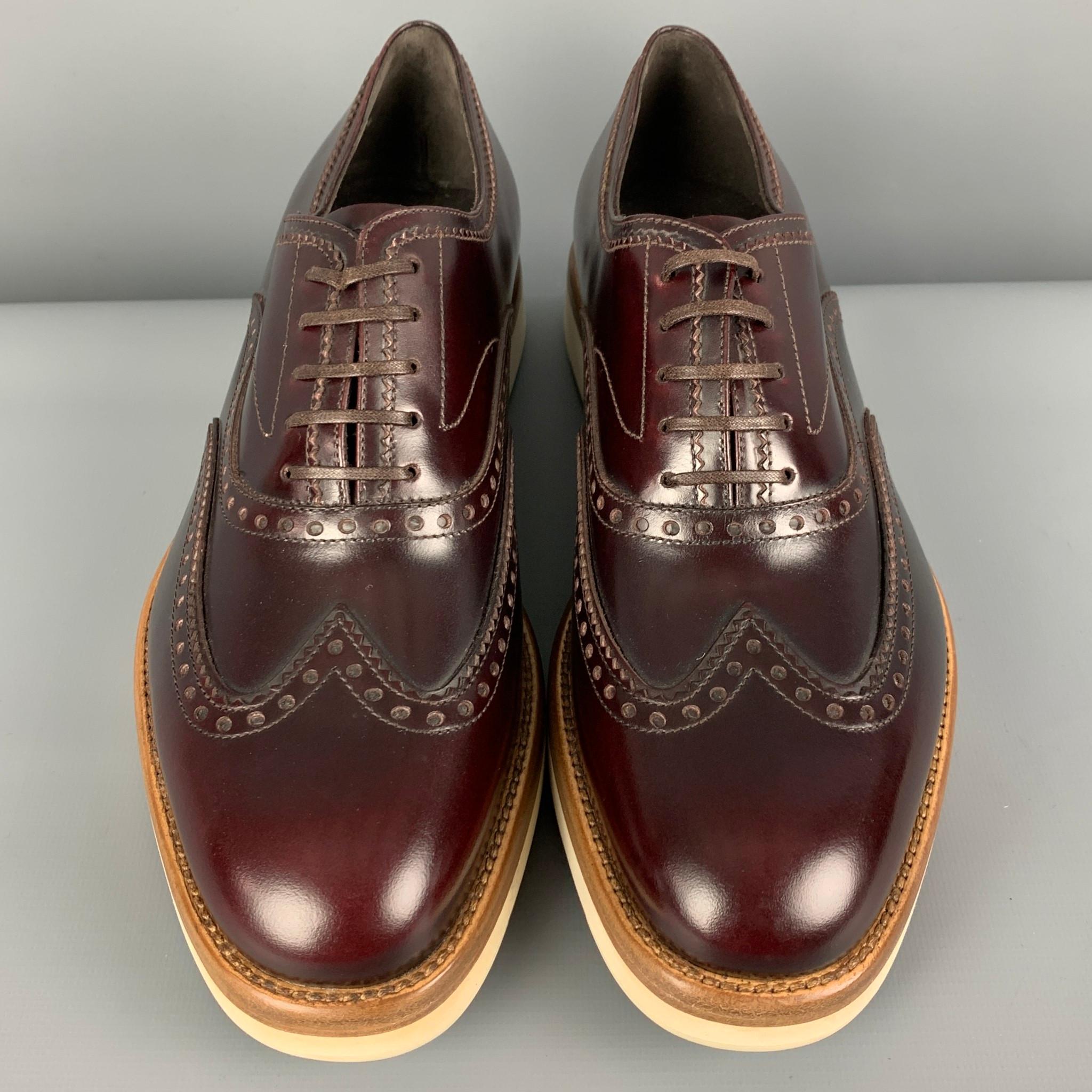 SALVATORE FERRAGAMO Size 8 Burgundy Perforated Leather Wingtip Lace Up Shoes In New Condition In San Francisco, CA
