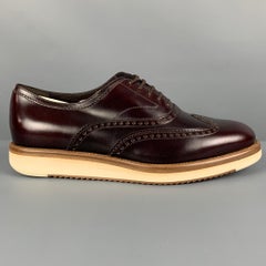 SALVATORE FERRAGAMO Size 8 Burgundy Perforated Leather Wingtip Lace Up Shoes