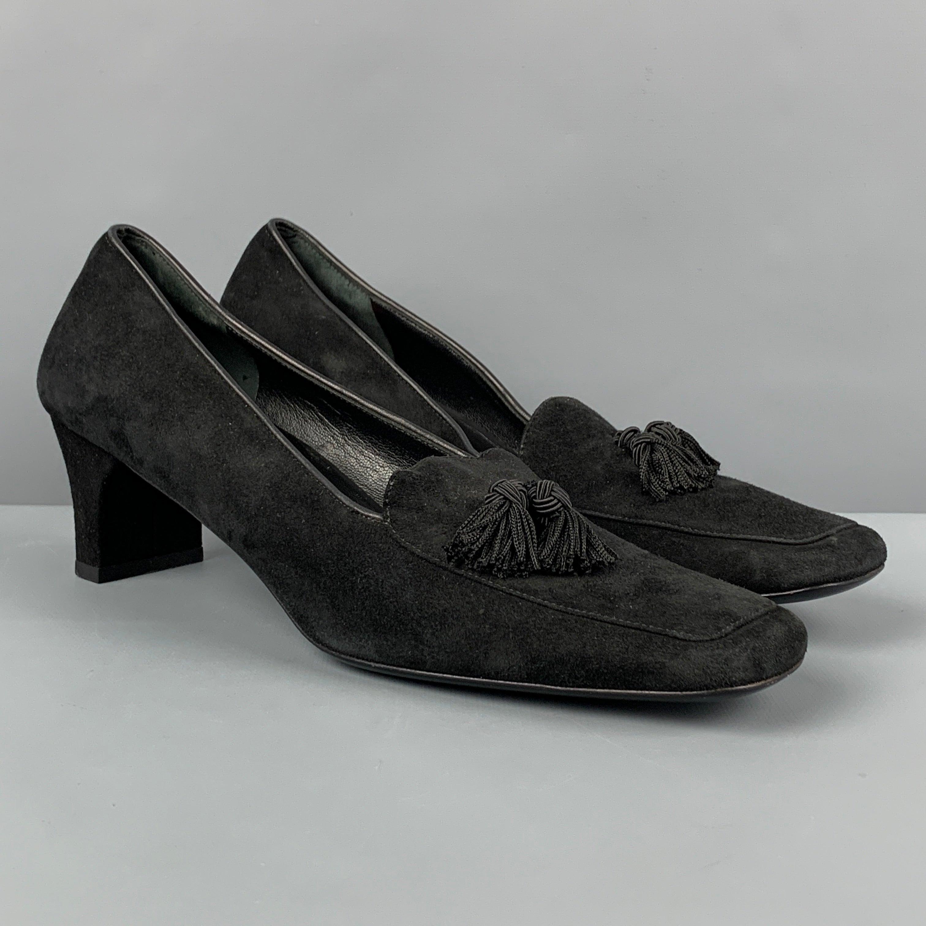 SALVATORE FERRAGAMO pumps comes in a black suede featuring a square toe, tassel details, an a kitten heel. Made in Italy.
 Very Good
 Pre-Owned Condition. 
 

 Marked:  9 
 

 Measurements: 
  Heel: 2.25 inches 
  
  
  
 Sui Generis Reference:
