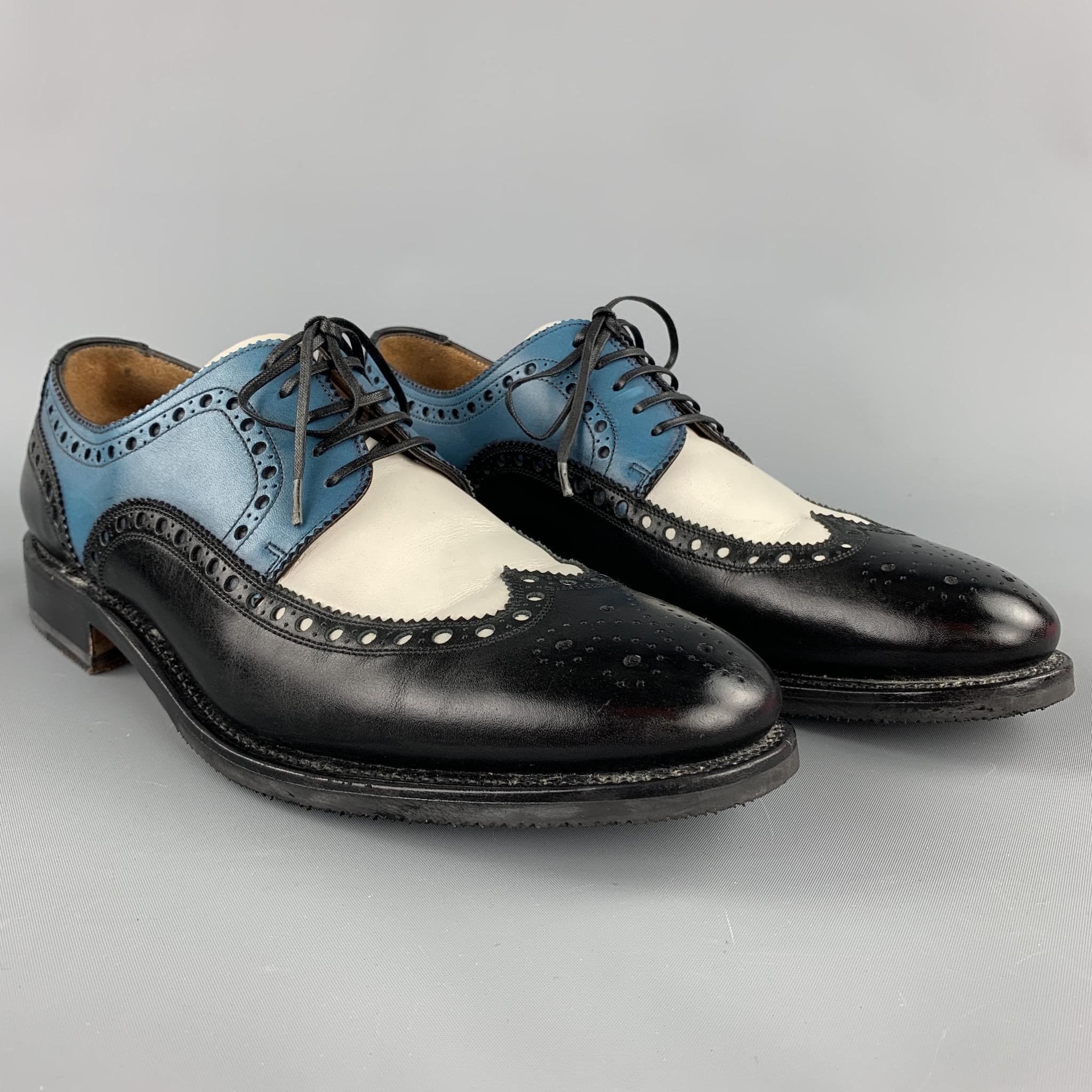 SALVATORE FERRAGAMO lace up shoes comes in a tri-color leather featuring a wingtip design and a wooden sole. Made in Italy.

Very Good Pre-Owned Condition.
Marked: 8.5 D
Original Retail Price: $1,150.00

Outsole:

12 in. x 4 in. 


