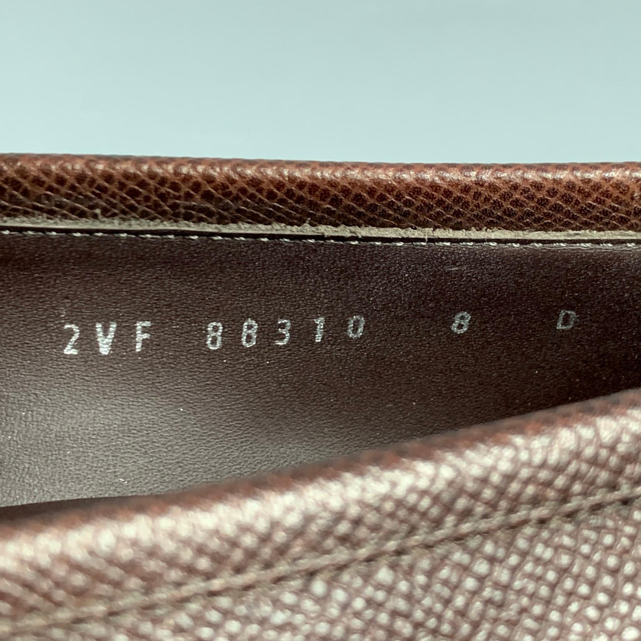 SALVATORE FERRAGAMO Twist Size 8 Dark Brown Pebble Leather Loafers In New Condition In San Francisco, CA