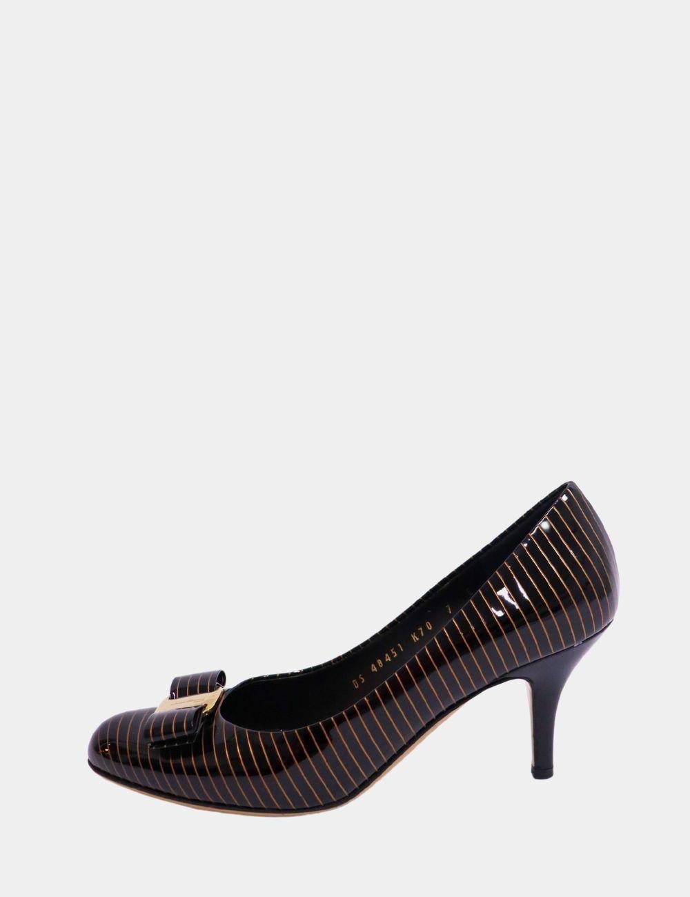 Salvatore Ferragamo Vara Bow Pumps, features a Semi-Pointed Toes, stiletto heels, and a Front Bow.

Material: Patent leather
Size: EU 37.5
Heel: 8cm
Overall Condition: Excellent
Interior Condition: Signs of use
Exterior Condition: Light Marks