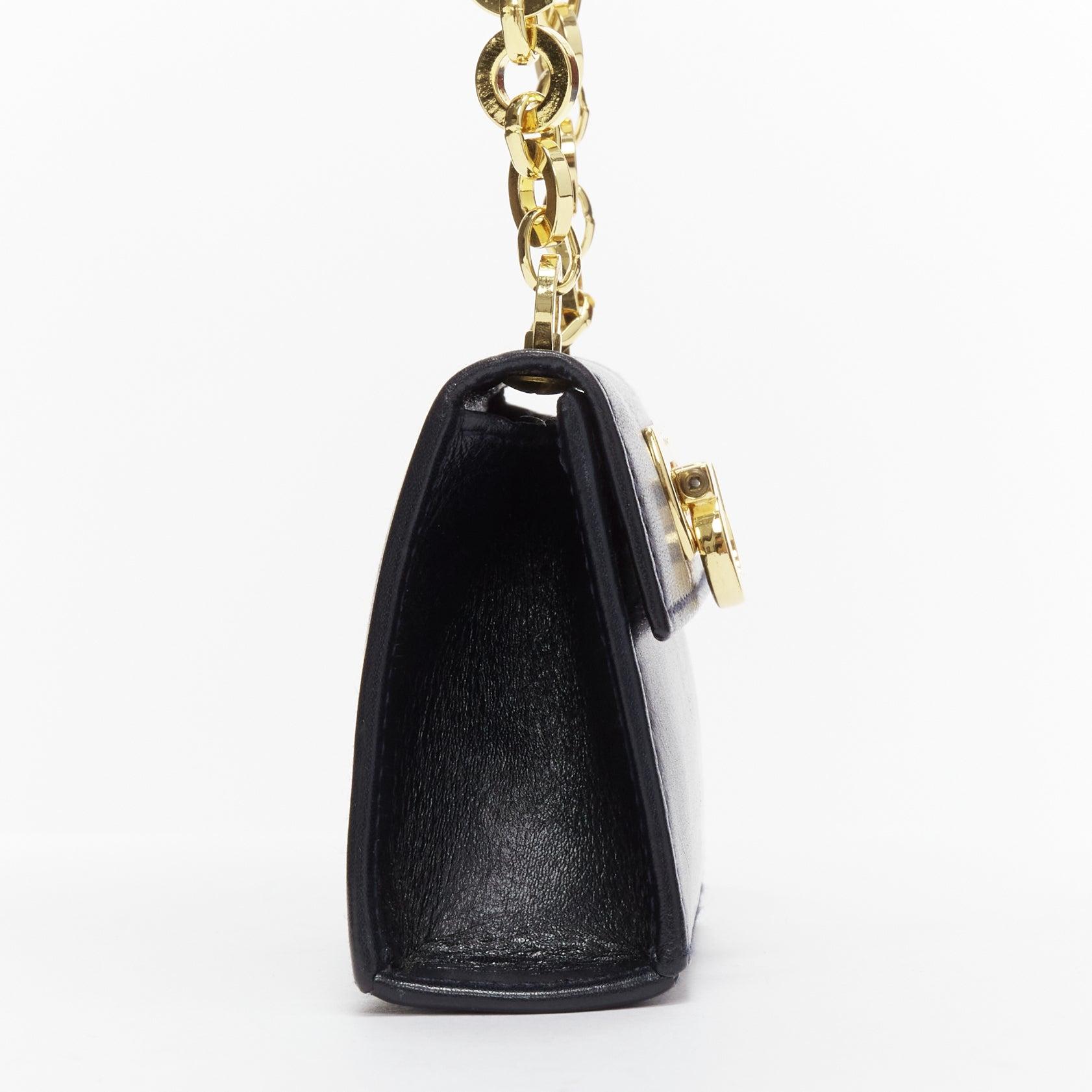 Women's SALVATORE FERRAGAMO Vintage Gancini black gold chain mini waist belt bag For Sale