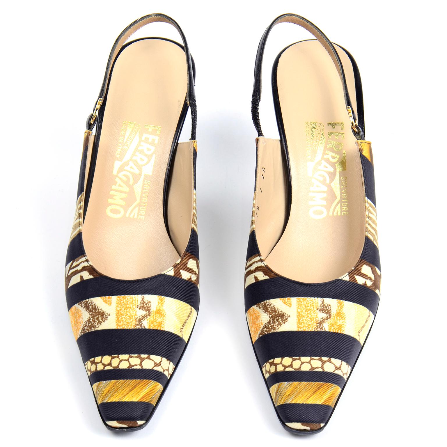 These lovely scarf print Salvatore Ferragamo silk and leather slingback heels have a slightly squared pointed toe. We actually had the matching scarf to these shoes but sold it a couple of years ago. The uppers are in a silk scarf print with a