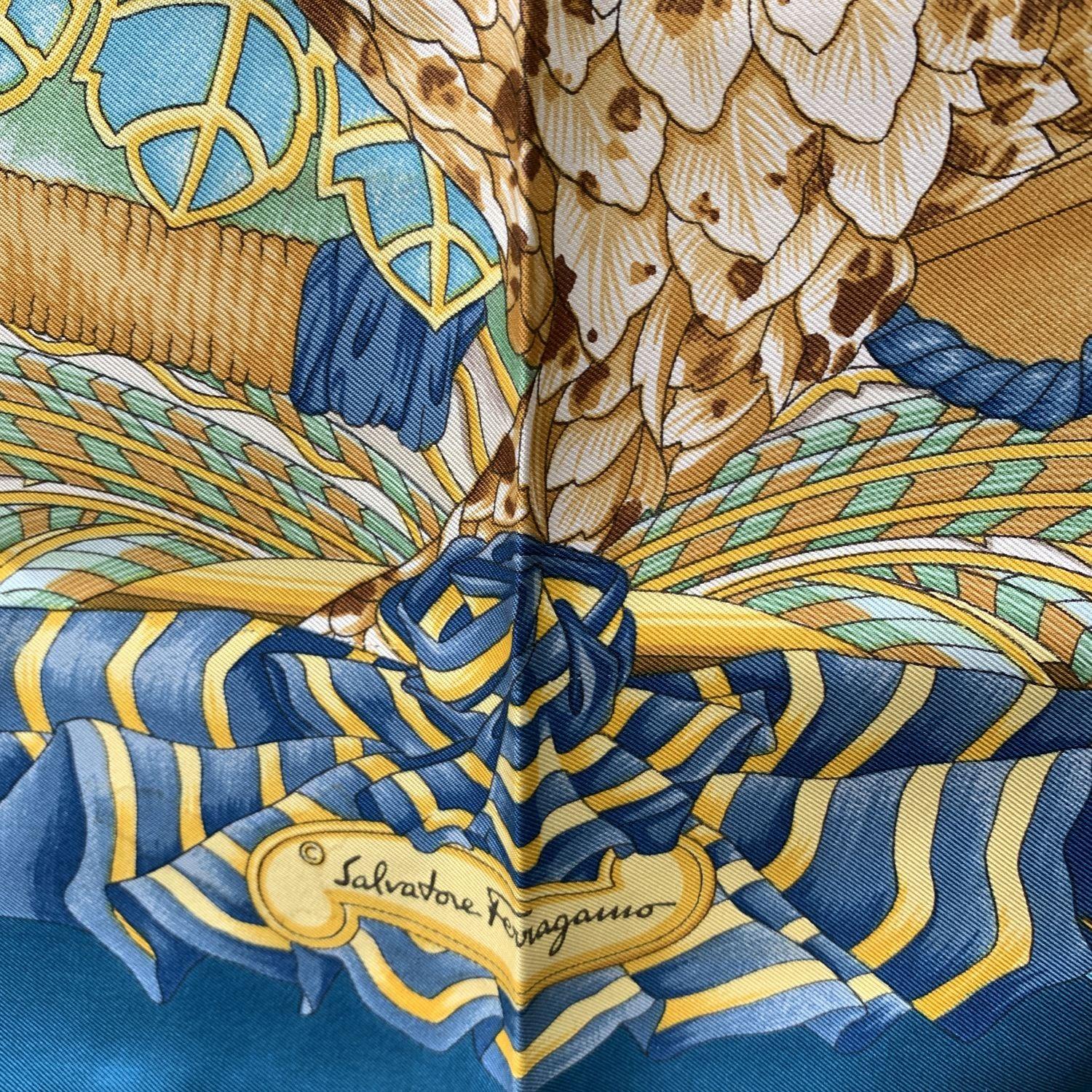 Vintage Salvatore Ferragamo silk scarf. Birds print. Hand rolled edges. Made in Italy. Composition: 100% silk. Measurements: 34.5 x 34.5 inches - 87.5 x 87.5 cm. 'Salvatore Ferragamo' signature printed on the scarf Details MATERIAL: Silk COLOR: