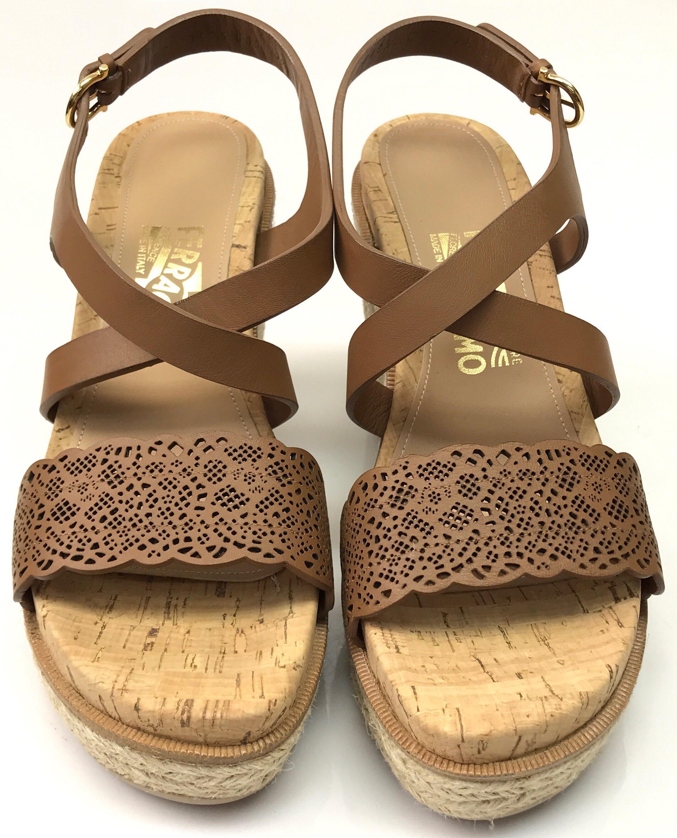 Salvatore Ferragamo Wedges w/ Brown straps-7.5. These adorable Salvatore Ferragamo wedges are in excellent condition. They show no sign of use. They are made of brown corkscrew material on the sole and have brown leather straps. There is a gold