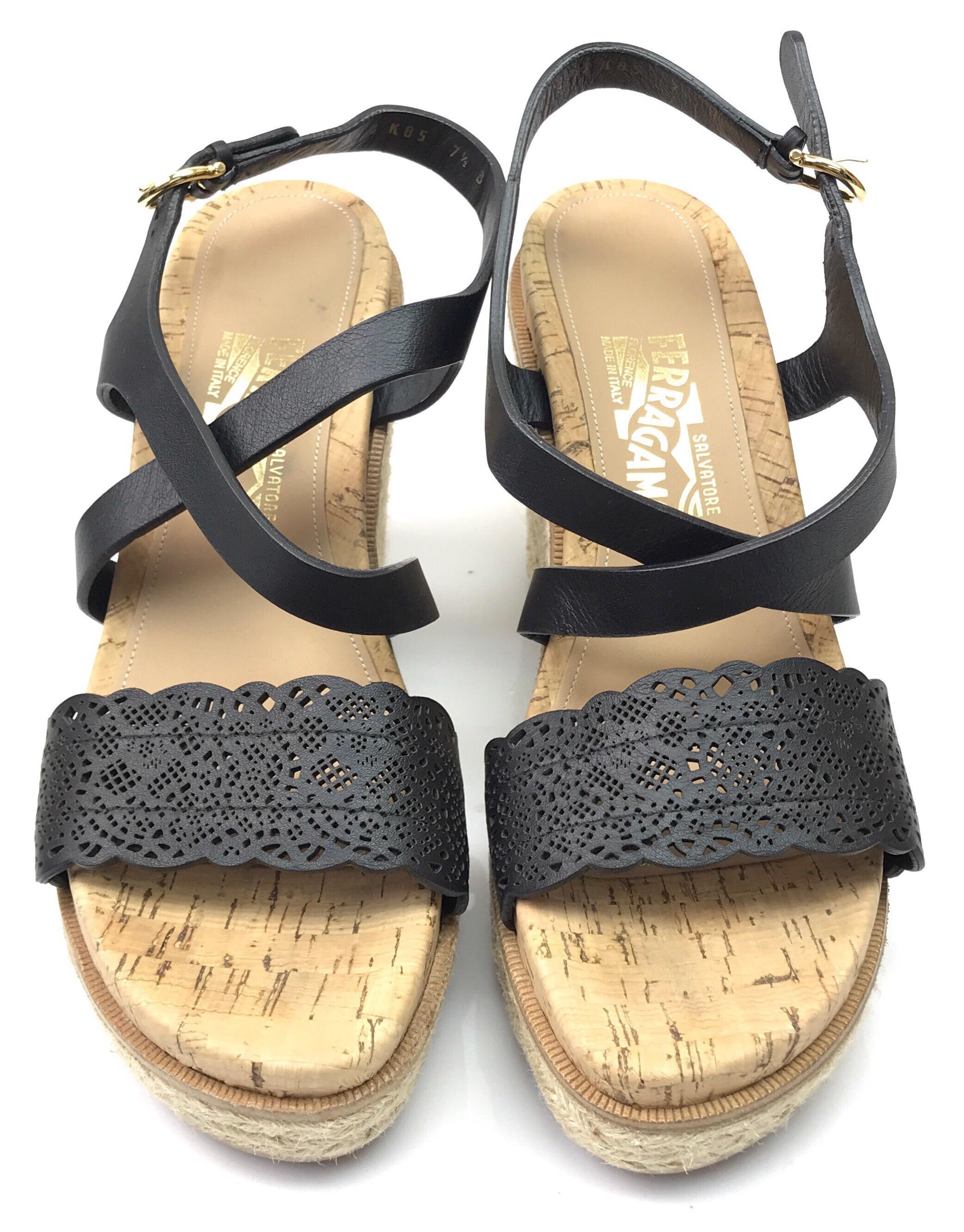 Salvatore Ferragamo Wedges with Black straps-7.5. These adorable Salvatore Ferragamo wedges are in excellent condition. They show barely any sign of use. They are made of a tan corkscrew material on the sole and have black straps. There is a gold