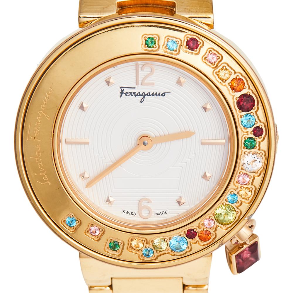 Exuding a true feminine grace and waiting to be yours is this stunner of a watch from Salvatore Ferragamo! This lovely Gancino FF5 timepiece is crafted from gold-plated steel and has a case diameter of 36mm and an attached charm accent. The sapphire