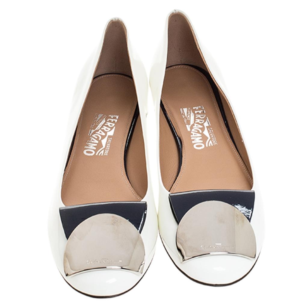 These patent leather flats are a must-have in your footwear collection. Stay comfortable on your next evening out in these flats which are set on durable soles. They feature metal accents on the uppers, round toes and leather insoles.

Includes: