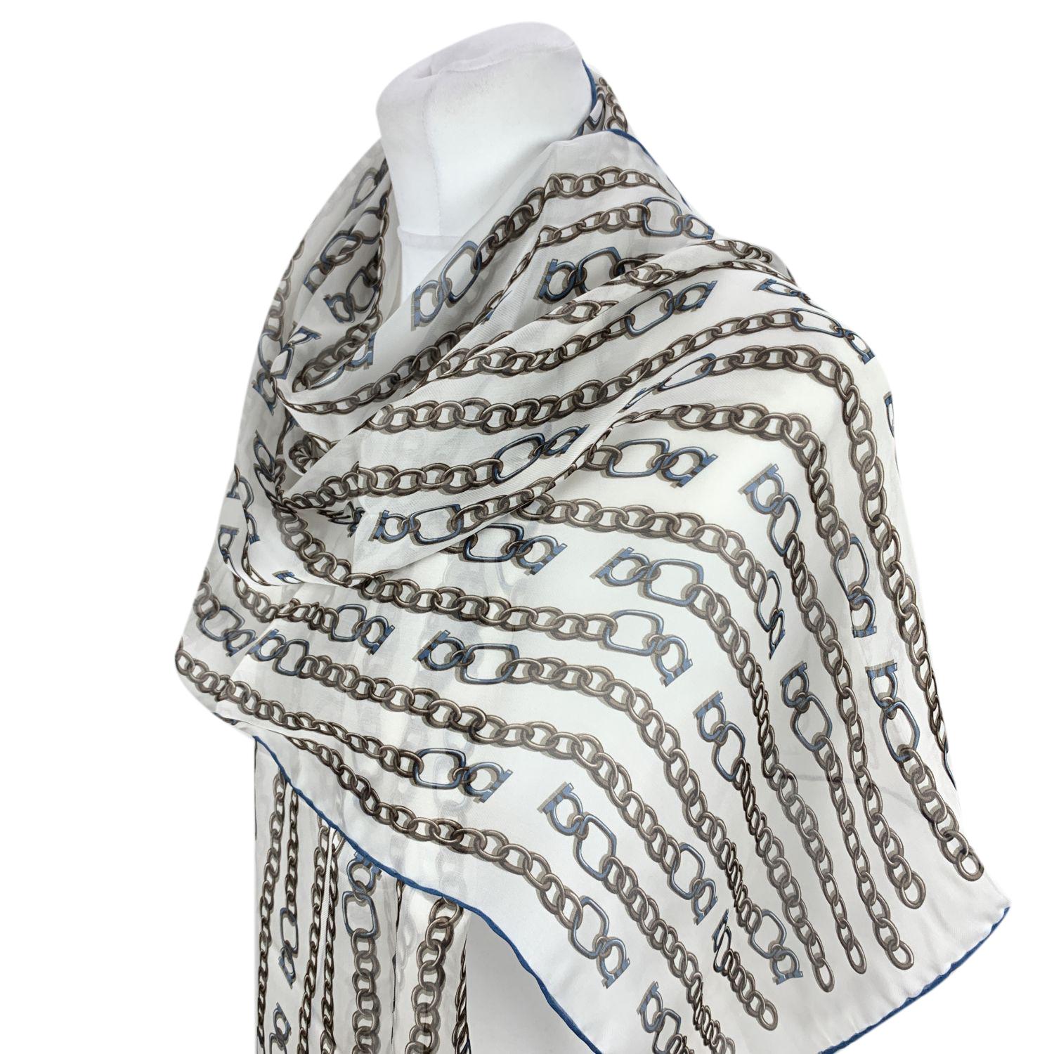 Salvatore Ferragamo 'Catena' oblong scarf. Chain and Gancini print. Whie color. Composition: 100 Silk. Measurements: 63 x 18 inches - 160 x 45 cm. Made in Italy.

Retail price was 195 Euros


Details

MATERIAL: Silk

COLOR: White

MODEL: Catena