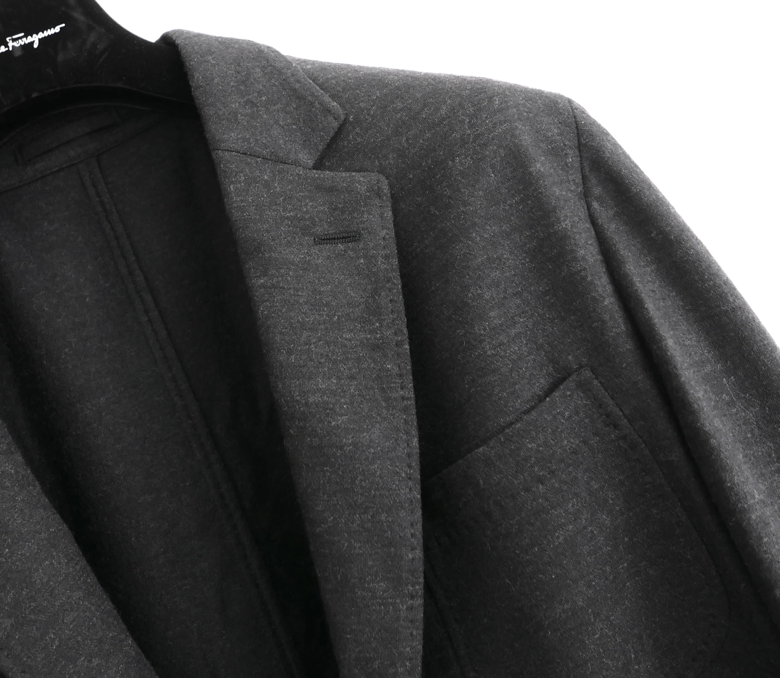 Relaxed Salvatore Ferragamo wool jersey sports jacket. Bought for £1450 and unworn with dustbag. Beautifully crafted from super soft grey wool jersey. It has an expertly softly tailored fit with single-breasted fastening, 3 patch pockets and button