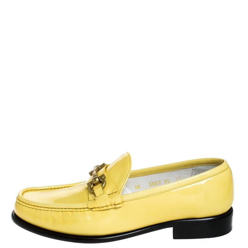 These loafers from Salvatore Ferragamo are not only high on appeal but also very skilfully made. They have been crafted from patent leather in Italy and designed with beauty using neat stitching and the Gancini accent on the uppers. The loafers have