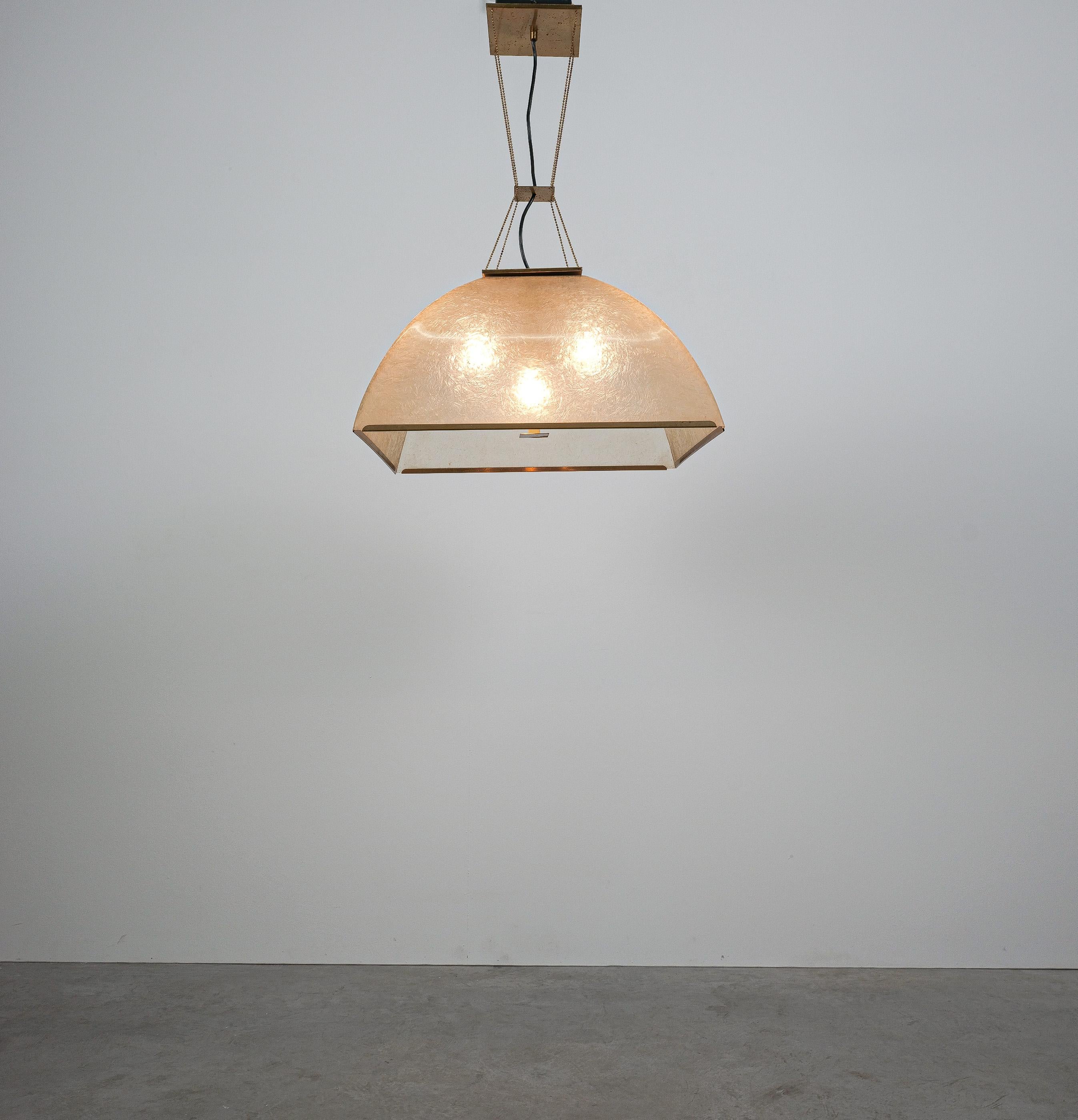 Salvatore Gregorietti, chandelier, fiberglass, brass, Italy, 1960s, labeled Lamperti

Sculptural chandelier by Italian designer Salvatore Gregorietti. The pendant consists of a huge fiberglass shade with 4 bulbs hanging from four brass 'pearl'