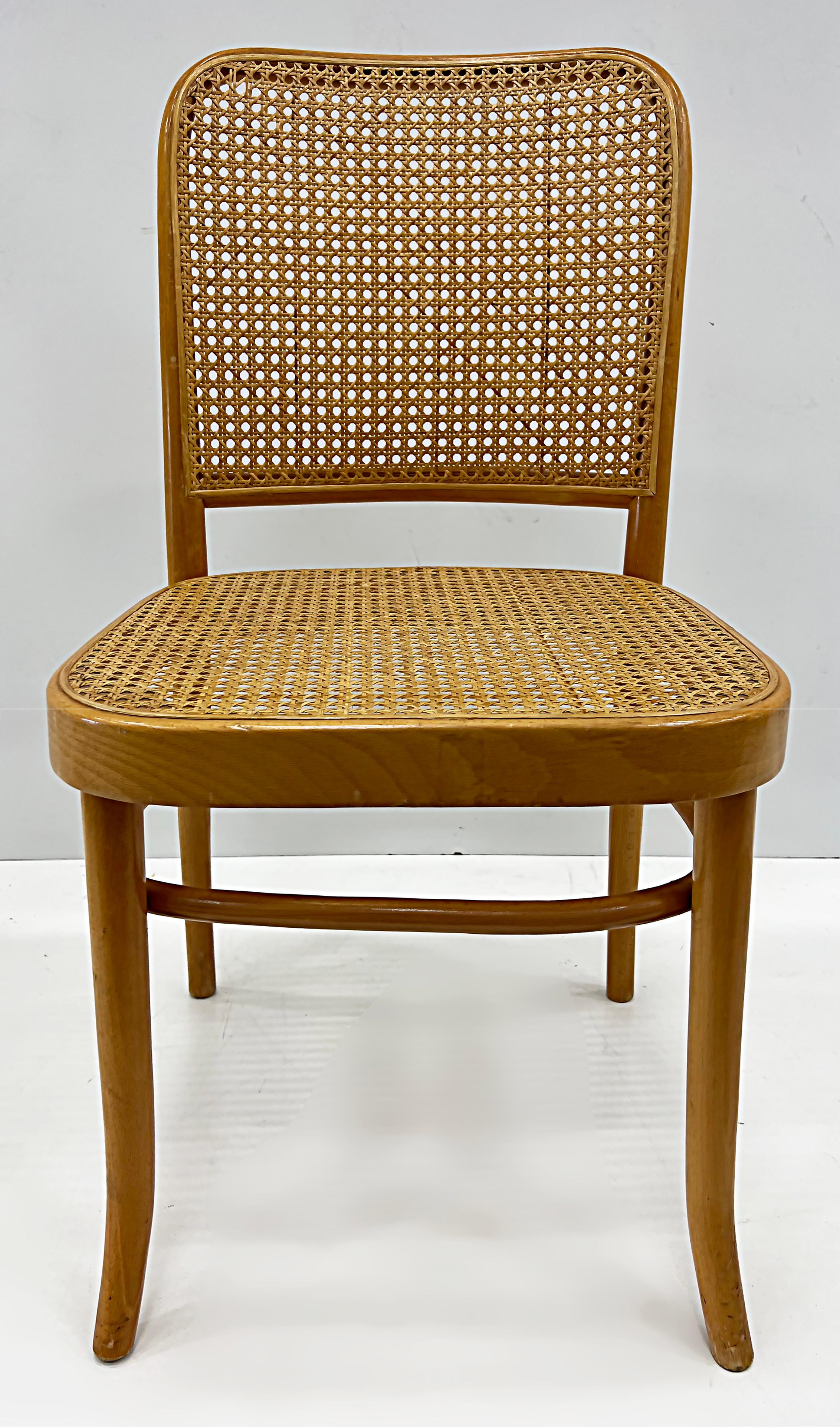 Salvatore Leone Vintage bentwood caned chairs, thonet style.

Offered for sale is a pair of vintage Thonet style bentwood chairs with caned seats and backs by Salvatore Leone. They are from Modena, Italy where Salvatore Leone created furniture in
