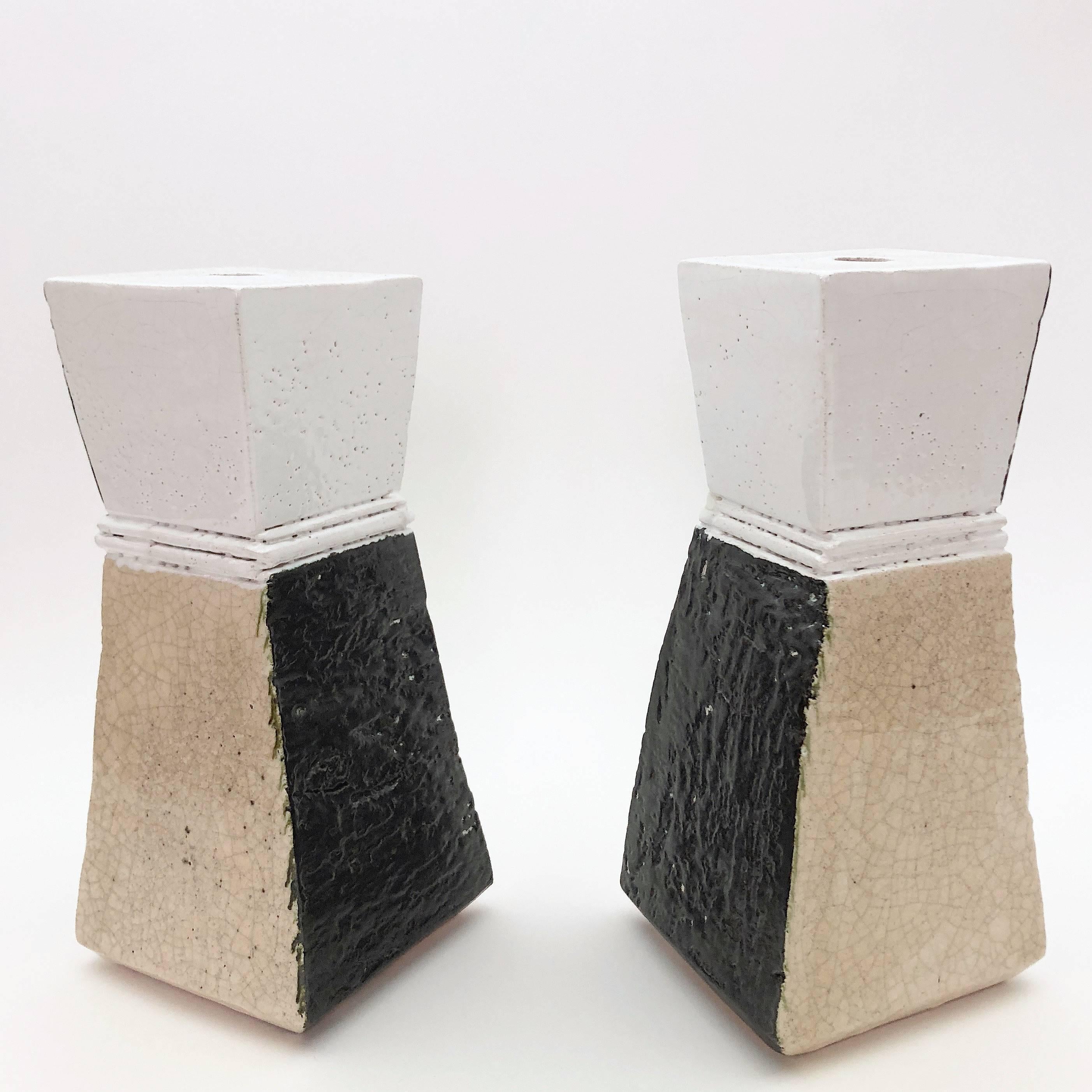 Pair of table lamp bases, geometric shaped, stoneware glazed in glossy pure white, cracked beige and dark brown.
One-of-a-kind hand-sculpted pieces, signed back with the artist's stamp.

Height dimensions are for the ceramic sculpture only and so
