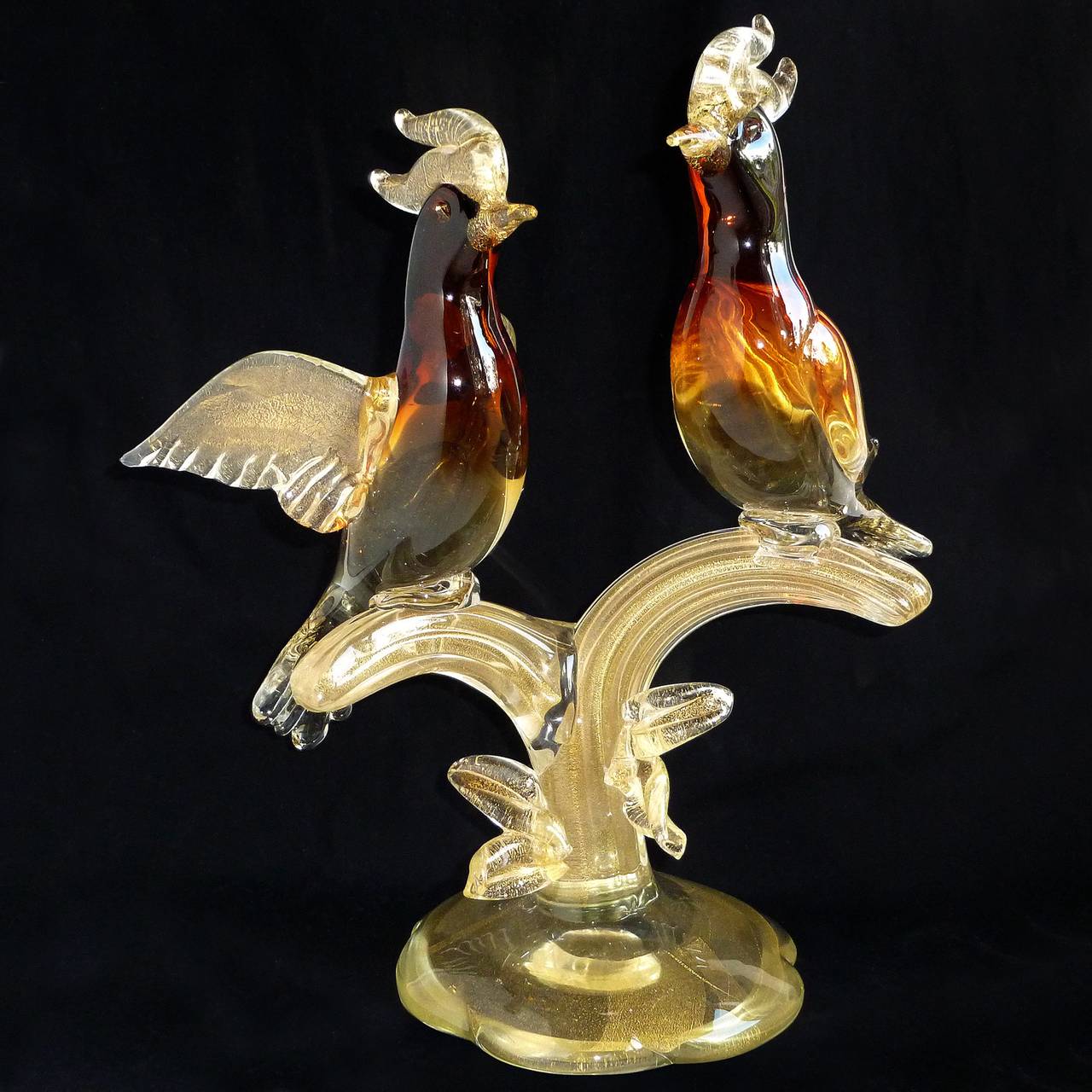 Beautiful, large vintage Murano hand blown Sommerso orange amber and gold flecks Italian art glass courting birds centrepiece sculpture. Attributed to the Salviati company. The deep amber color fades down the birds body until it becomes clear. The