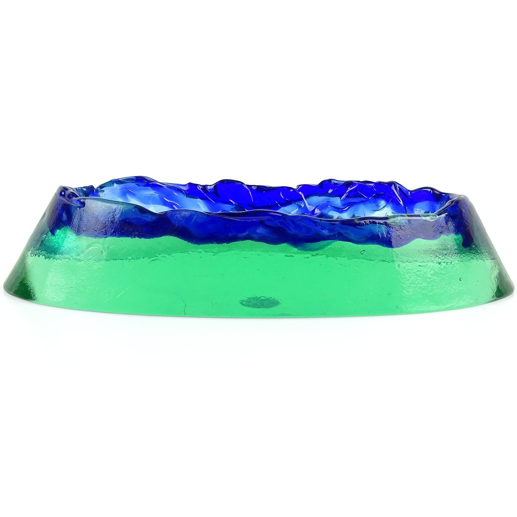 Beautiful vintage Murano hand blown blue and green Sommerso volcano island, with mountain range rim Italian art glass sculptural bowl. Documented to the Salviati Company. Original label fell off a few years back, so what you see as a round shadow is