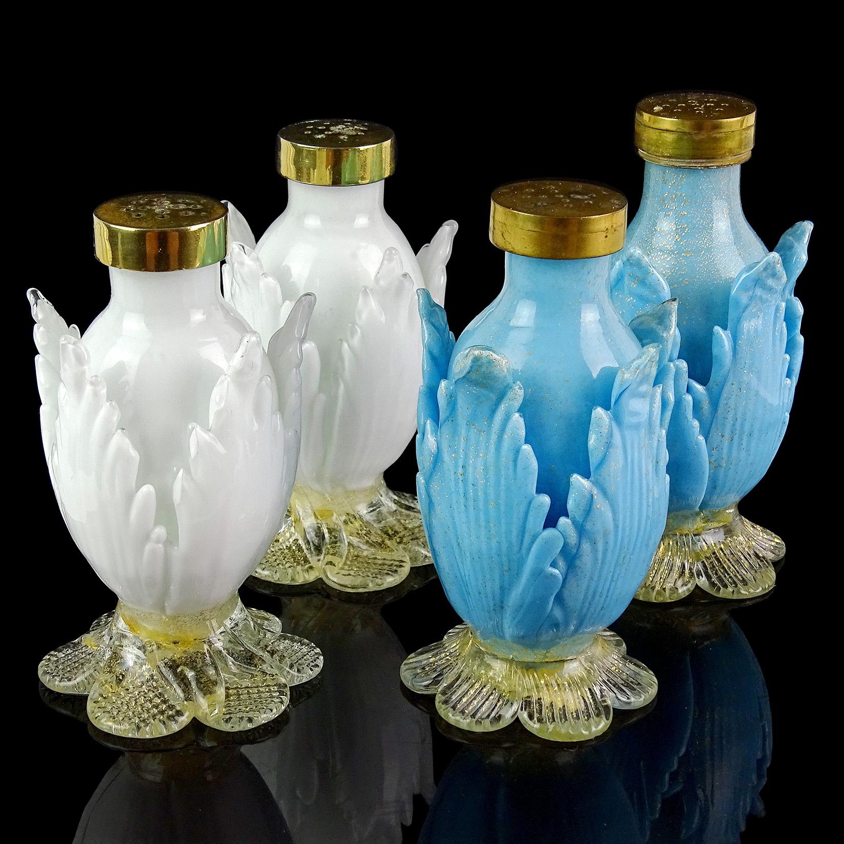 Priced per set - Beautiful Murano hand blown blue with gold flecks, and white and gold flecks, Italian art glass leaf / feather shaped salt and pepper shakers. Documented to the Salviati Company. The blue set has gold throughout all of it. The white