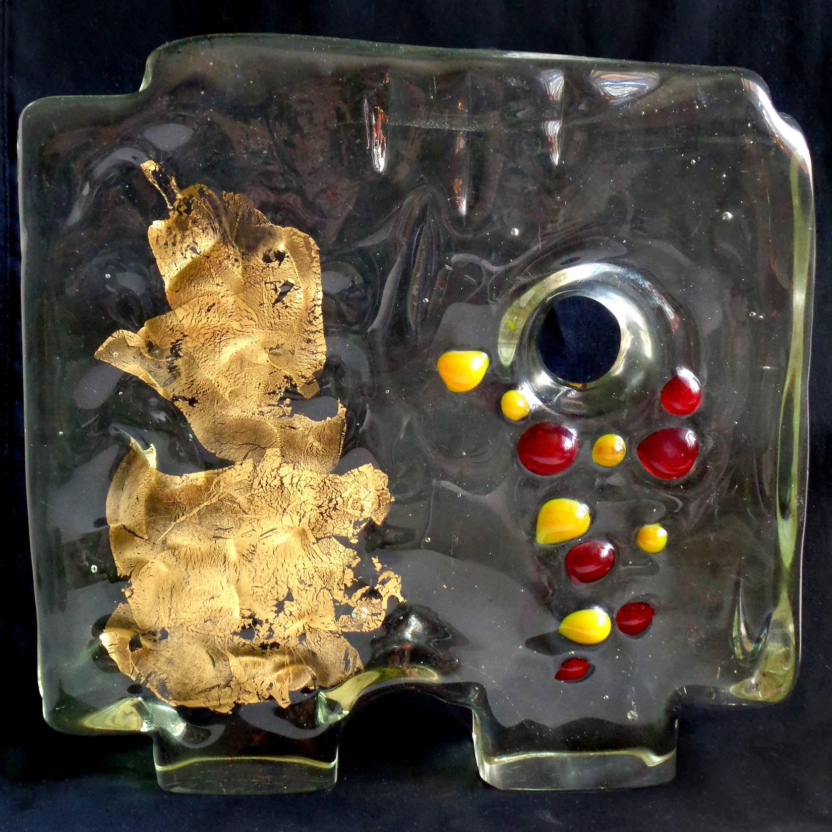 Murano hand blown Italian art glass crystal clear abstract table sculpture with heavy gold leaf and dot decoration. Attributed to the Salviati Company. It has yellow and red dots, with pieced body. Measures: 10