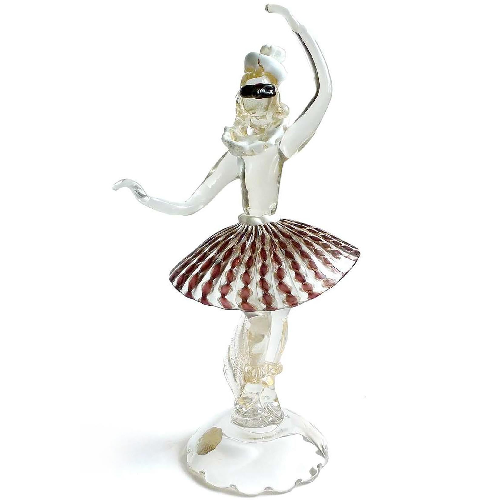 Beautiful and unique, vintage Murano hand blown Italian art glass dancing ballerina sculpture with harlequin mask, hat and Zanfirico ribbons skirt. Documented to the Salviati company, marked with an original 