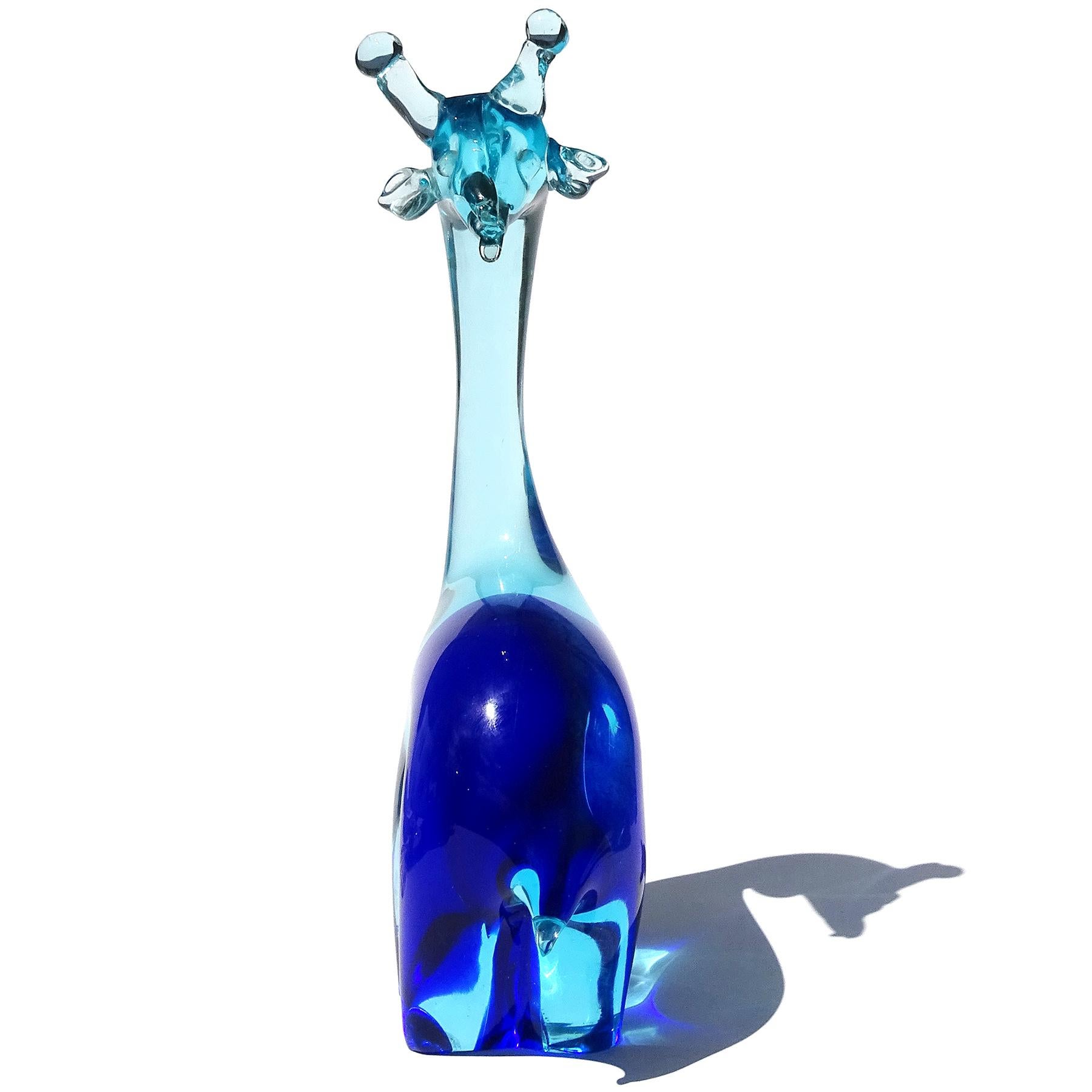 Beautiful, and large, vintage Murano hand blown Sommerso light blue over cobalt blue Italian art glass giraffe figure sculpture. The piece is documented to the Salviati company, circa 1960s. It is published in 