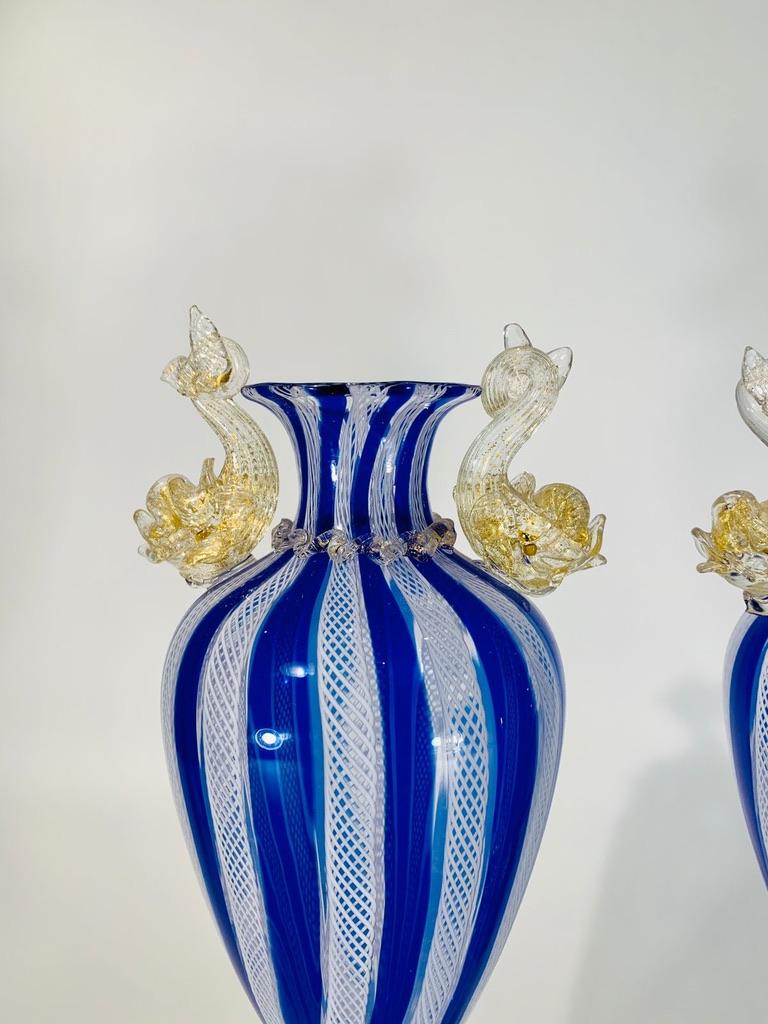 Italian Salviati Murano vase pair of vases circa 1950 with applied dolphins in gold. For Sale