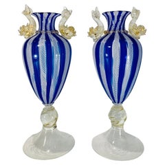Vintage Salviati Murano vase pair of vases circa 1950 with applied dolphins in gold.