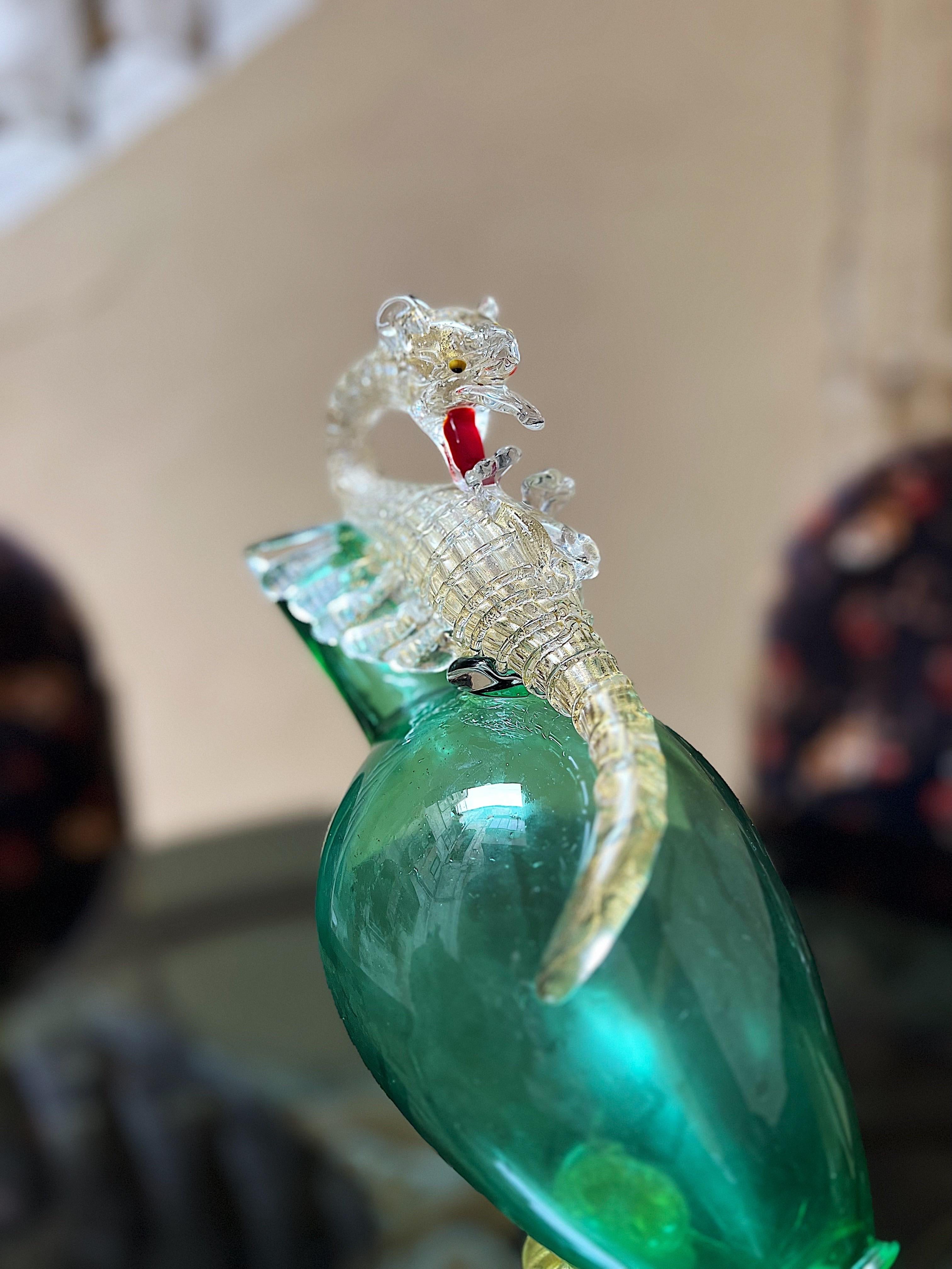 An exceptional example of Venetian glassblowing mastery, this large and impressive carrafe made by Antonio Salviati is sure to impress! 

All handblown elements are fused together to create this masterpiece; the caraffe is in a vibrant apple